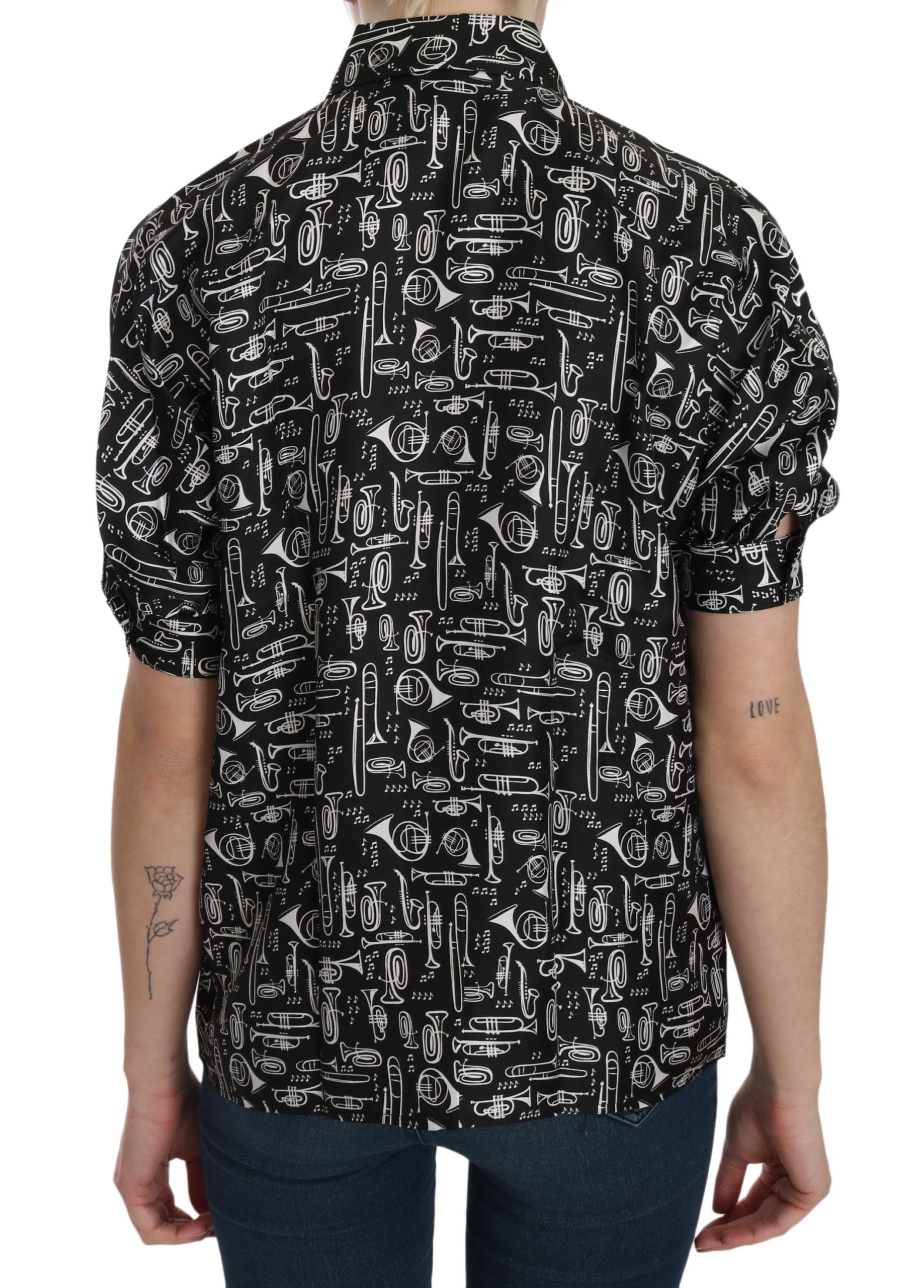 Zwarte blouse met muziekinstrumentkraag