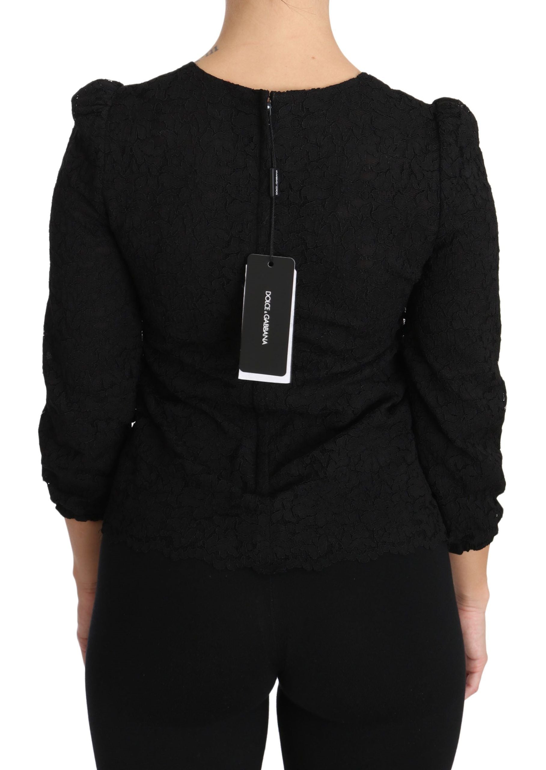 Zwarte blouse met bloemenkant en rits