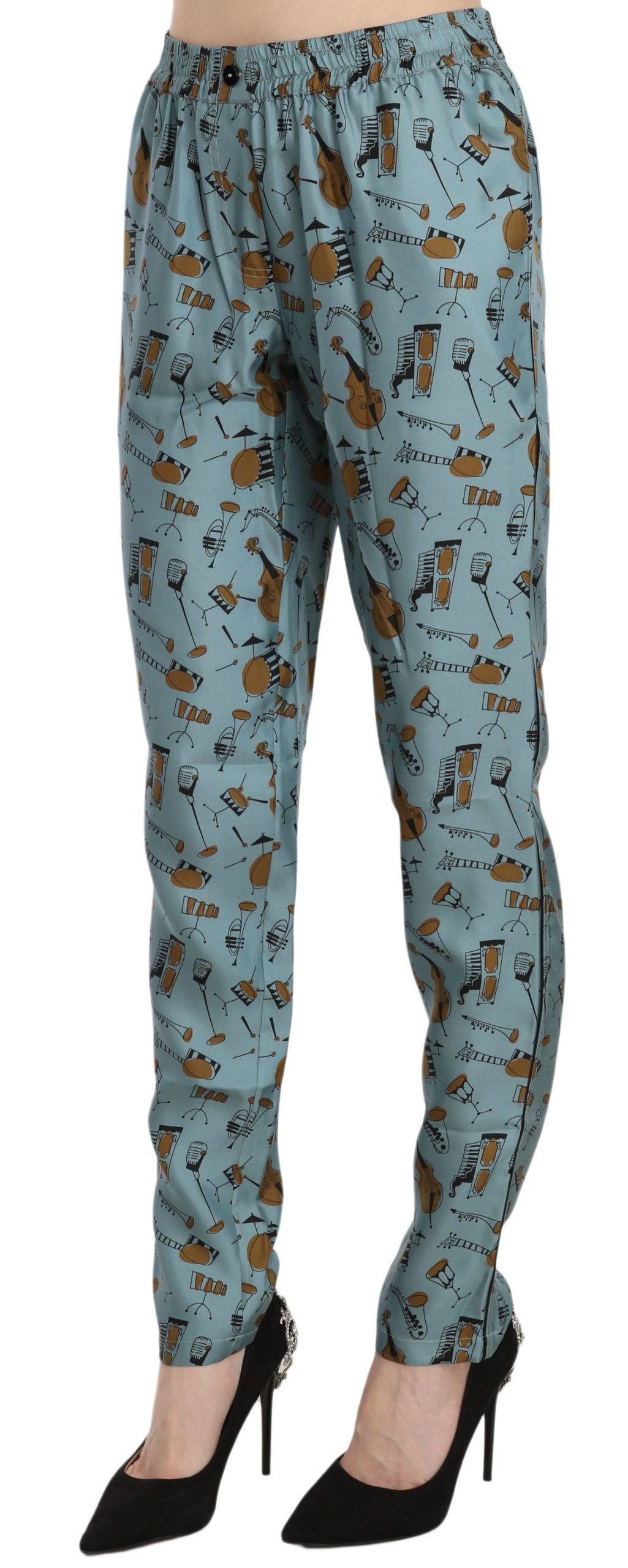 Blauwe muziekinstrumentenprint taps toelopende broek