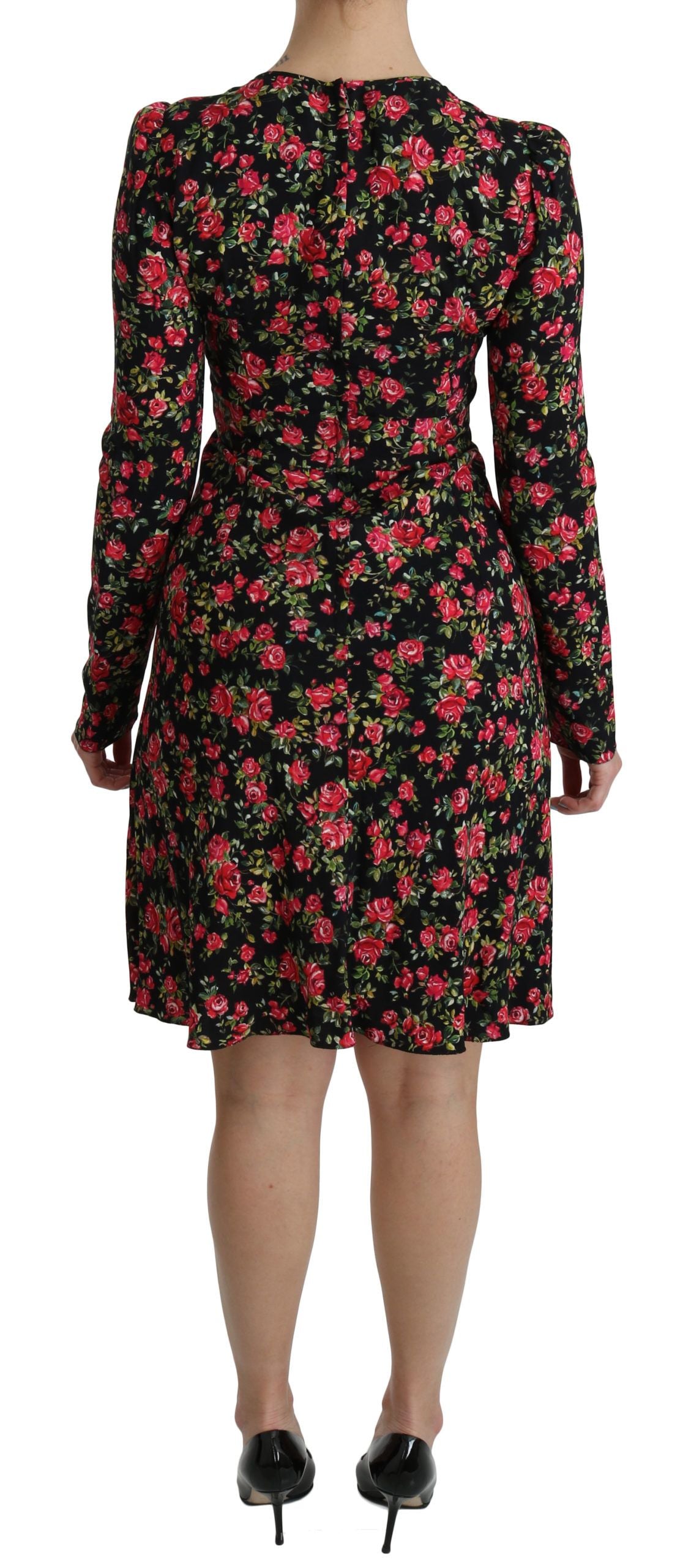 Zwarte bloemenjurk met lange mouwen tot op de knie