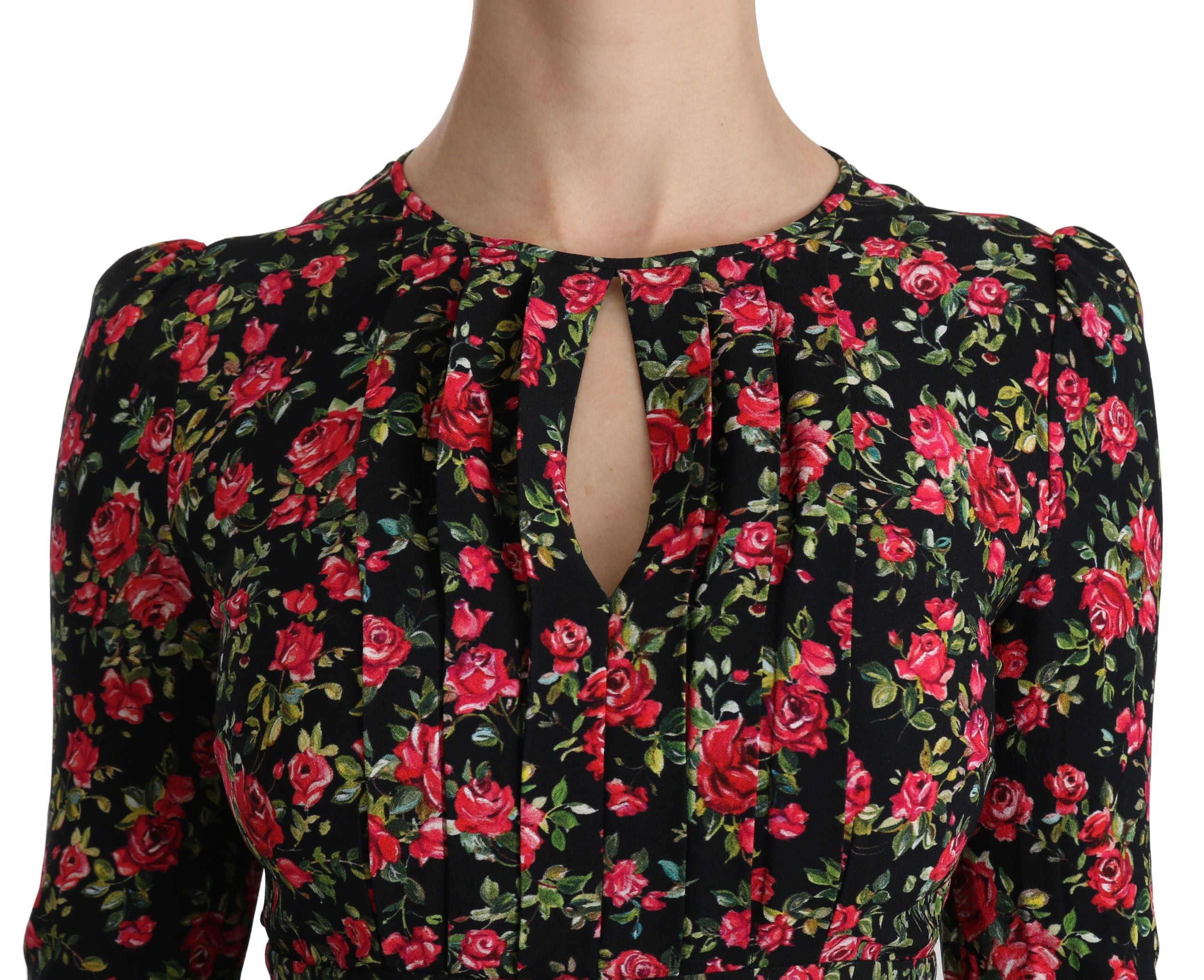 Zwarte bloemenjurk met lange mouwen tot op de knie