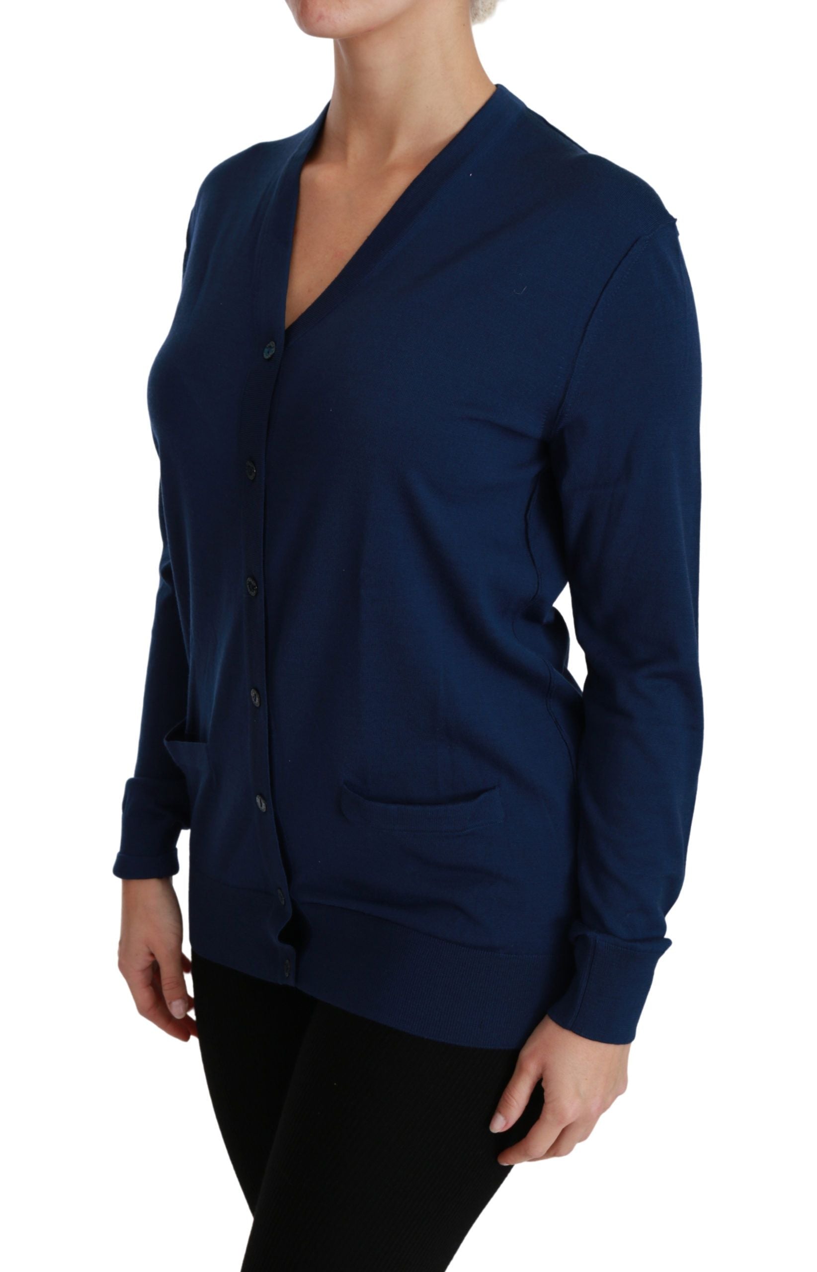 Blauwe knoopvest van maagdelijke wol