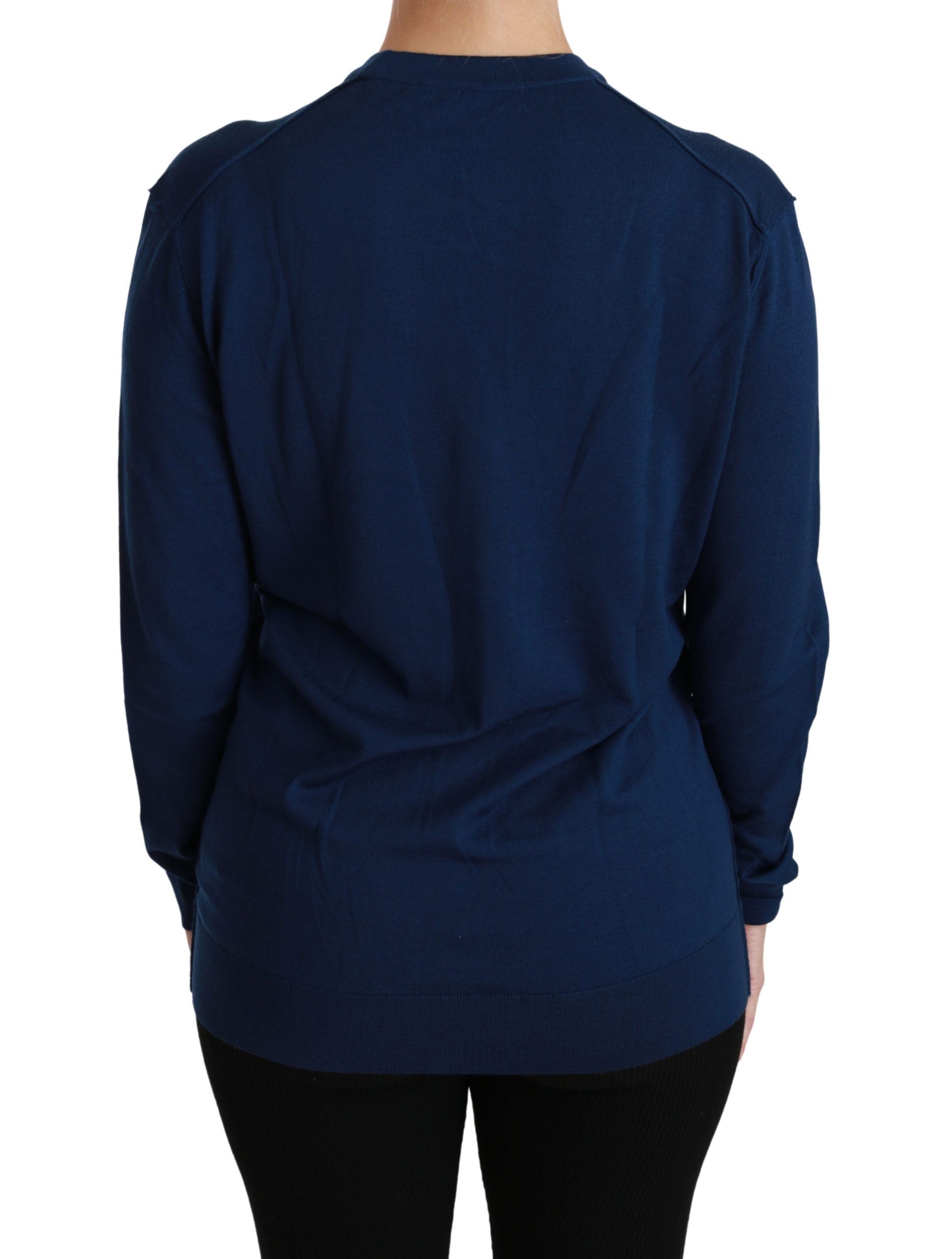 Blauwe knoopvest van maagdelijke wol