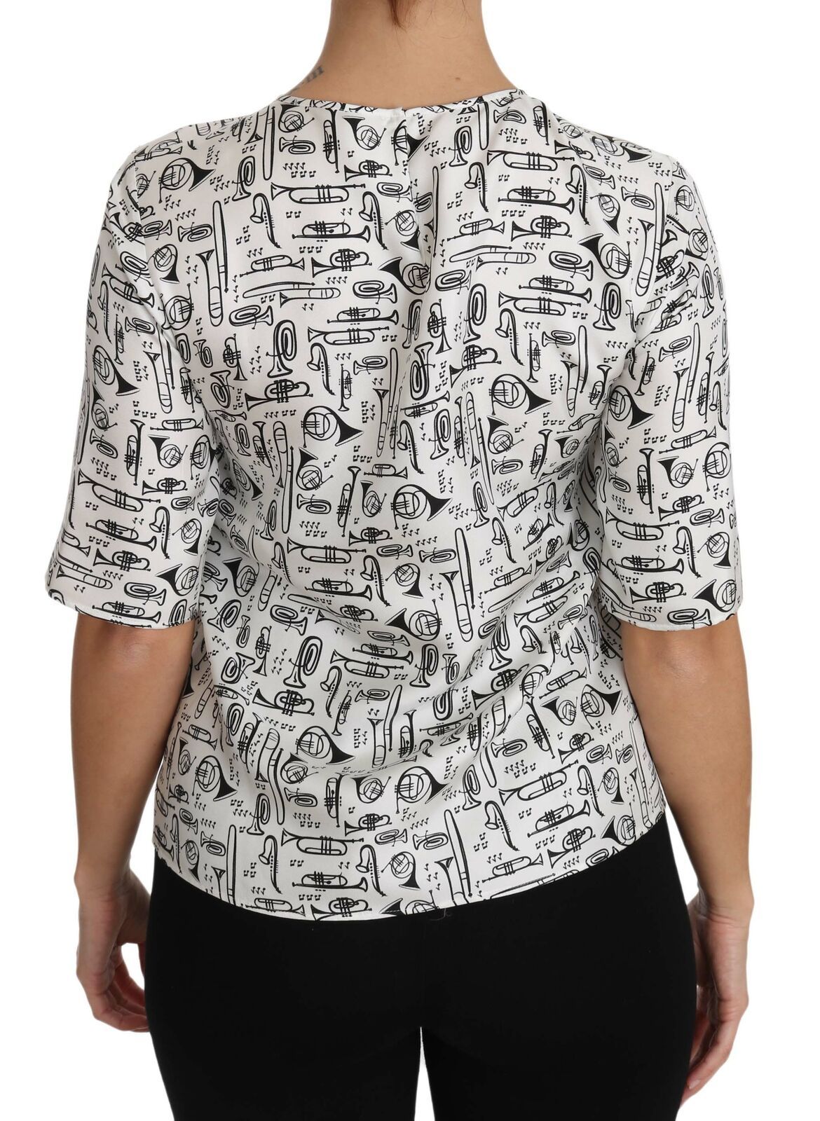 Witte blouse met muziekinstrumentenprint