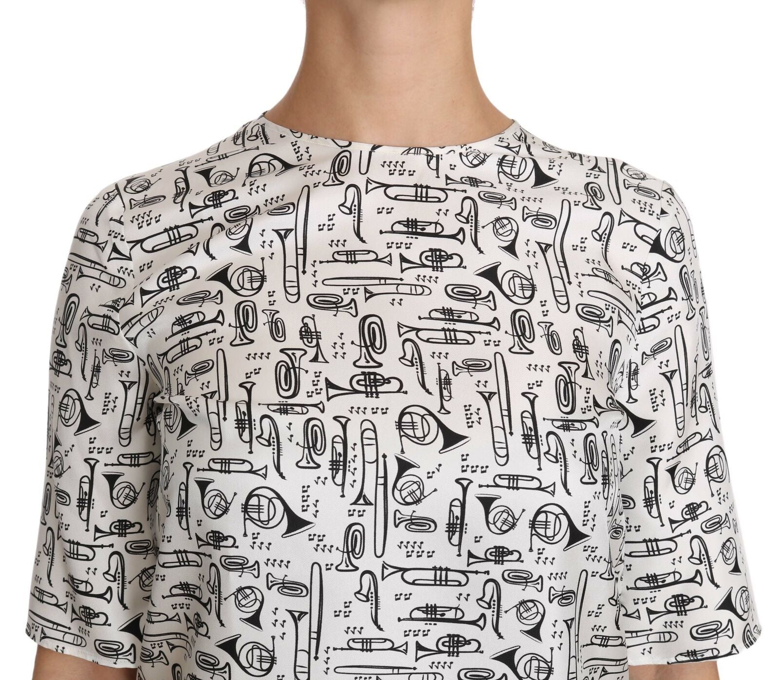 Witte blouse met muziekinstrumentenprint