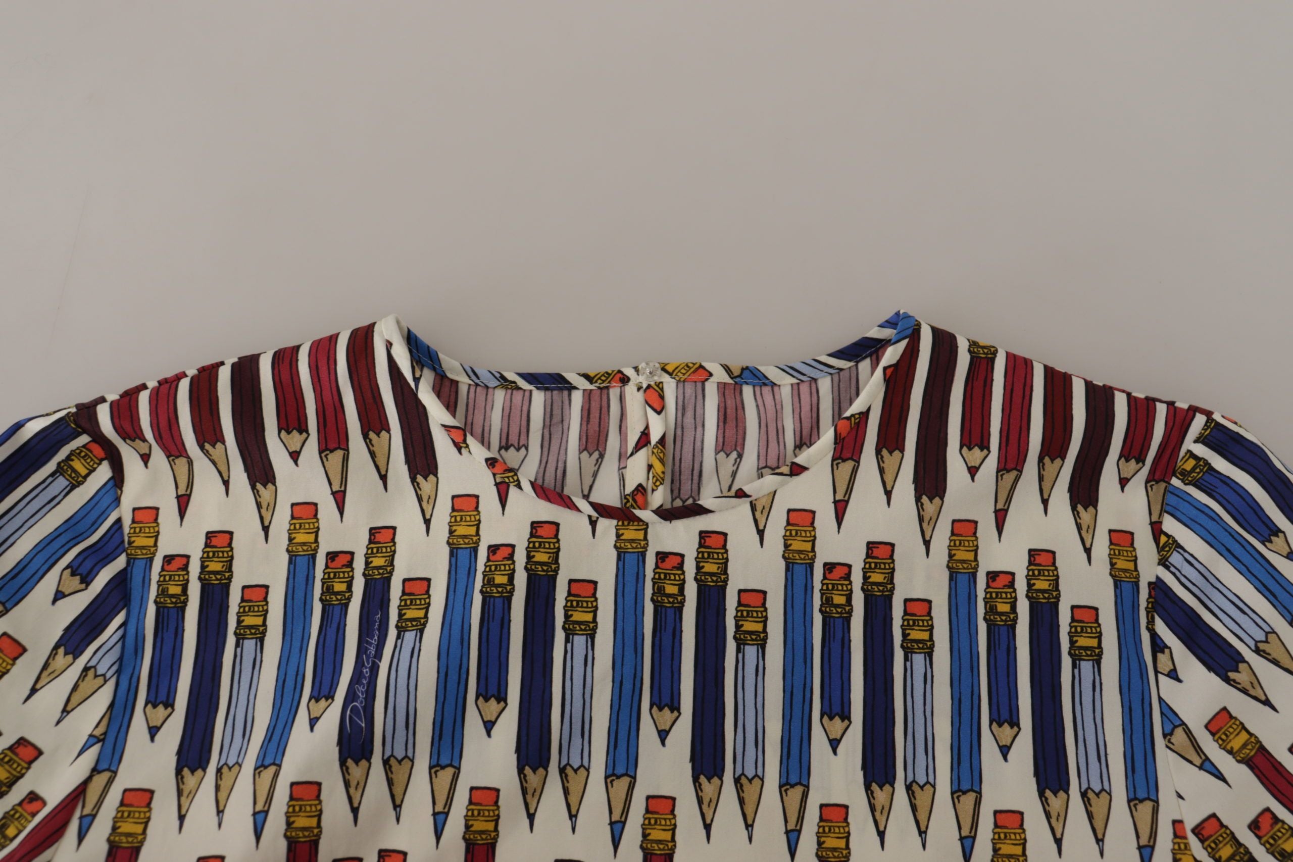 Witte katoenen T-shirtblouse met potloodprint