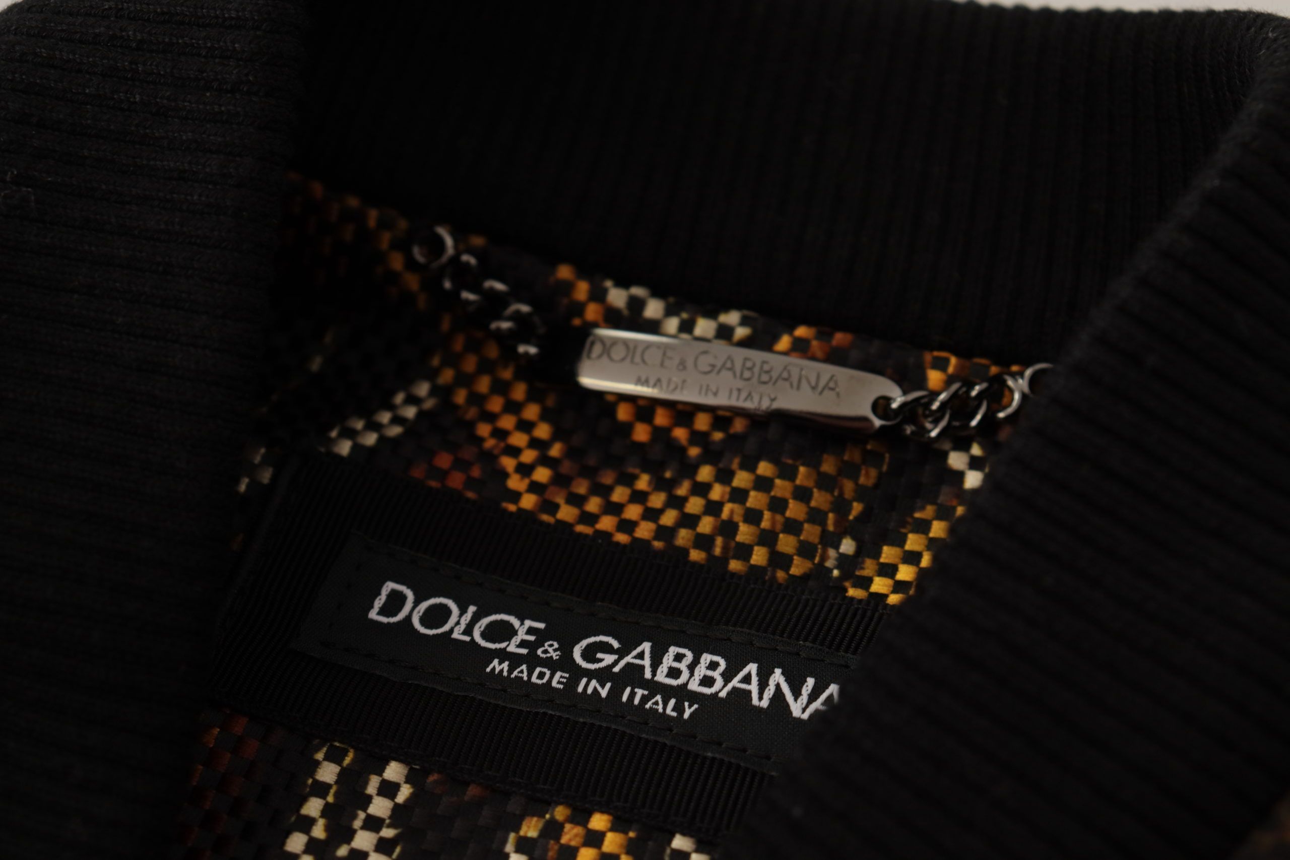 Bruine, doorlopende ritsblouse met veren