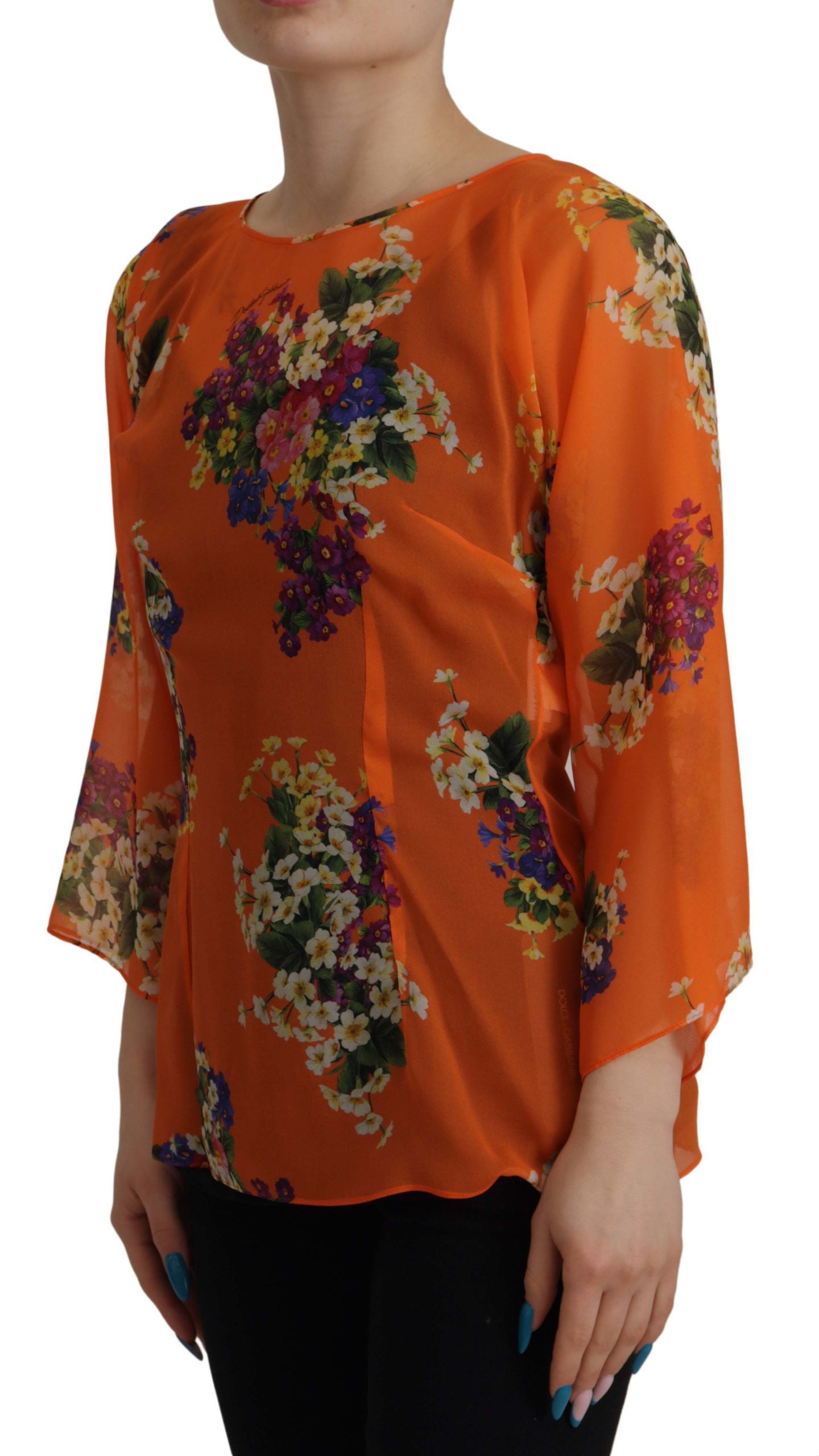 Oranje blouse met bloemenprint en lange mouwen