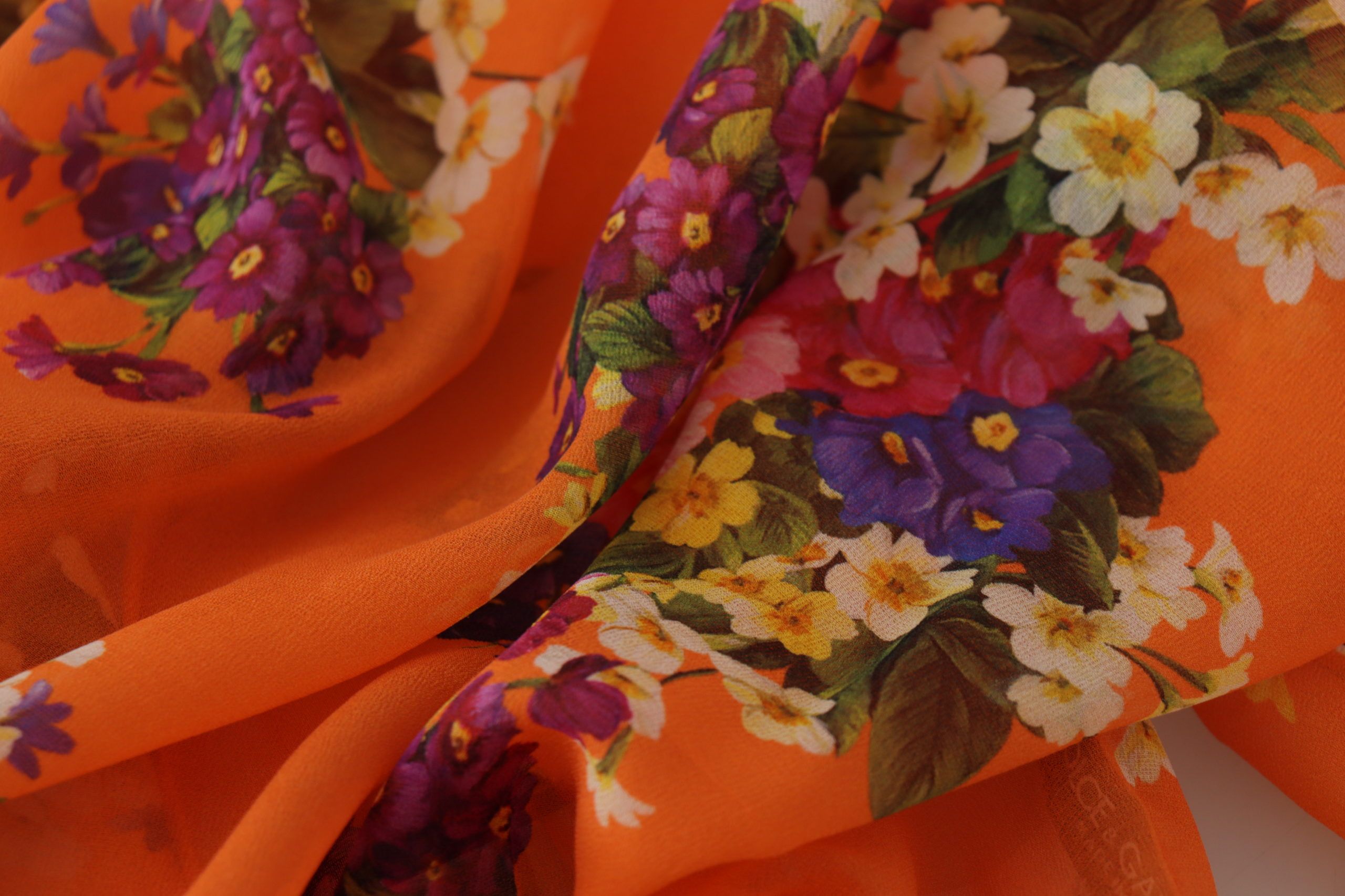 Oranje blouse met bloemenprint en lange mouwen