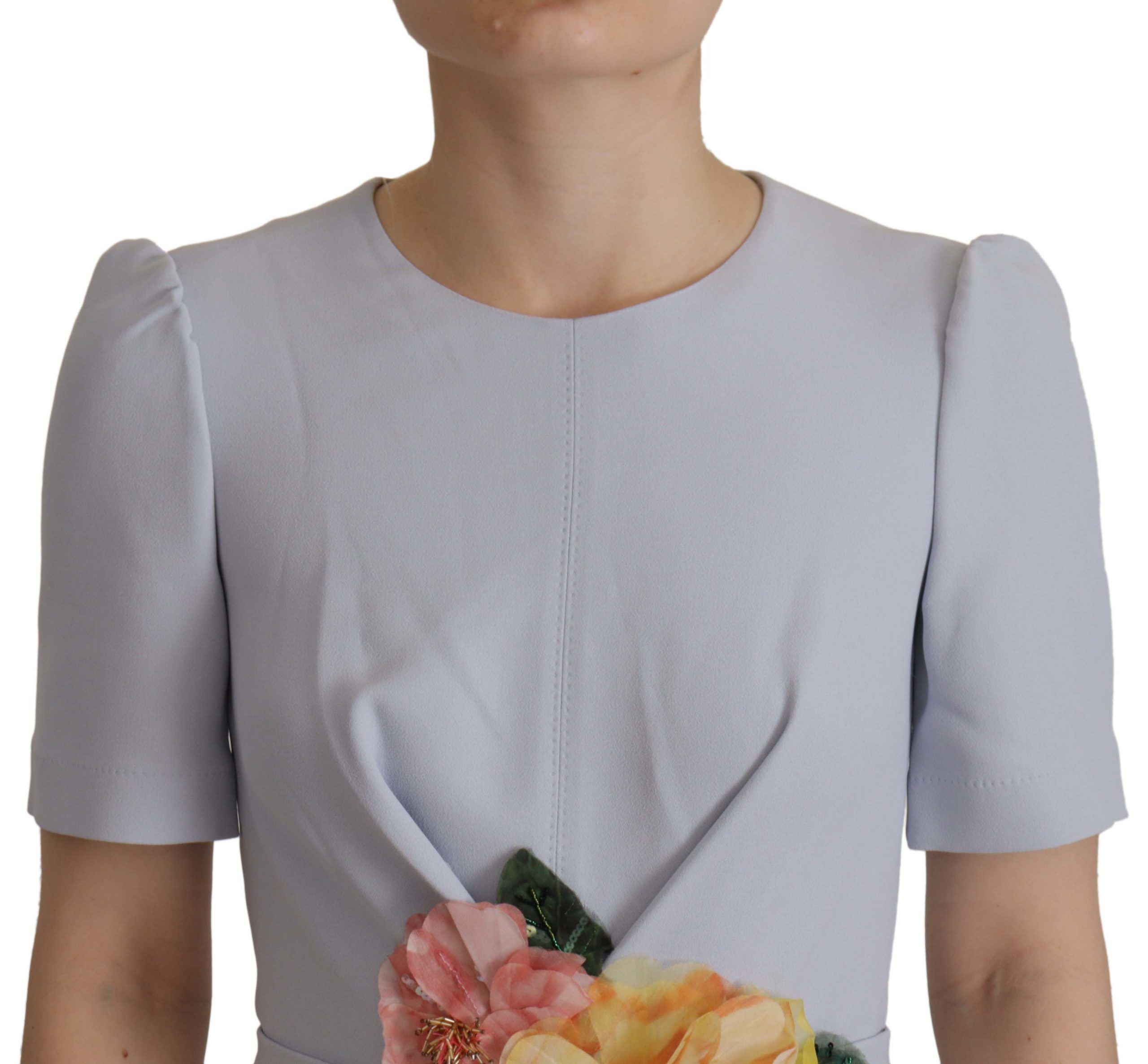 Blauwe midi-viscosejurk met bloemenapplicatie