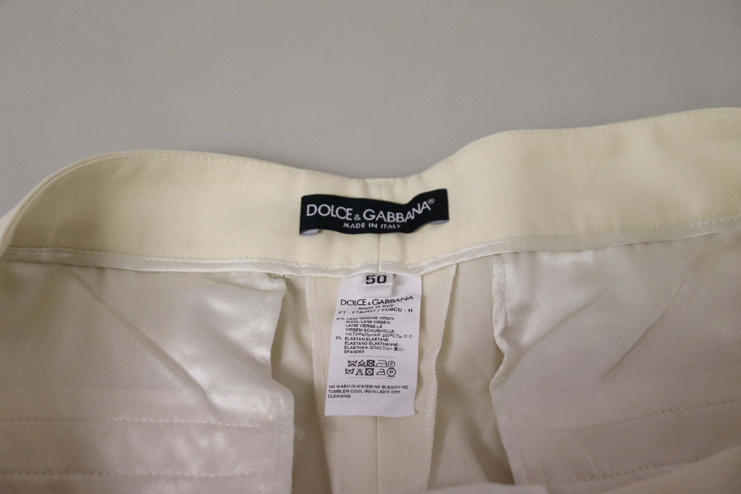 Ivoorkleurige hoge taille cropped gevouwen zoom broek