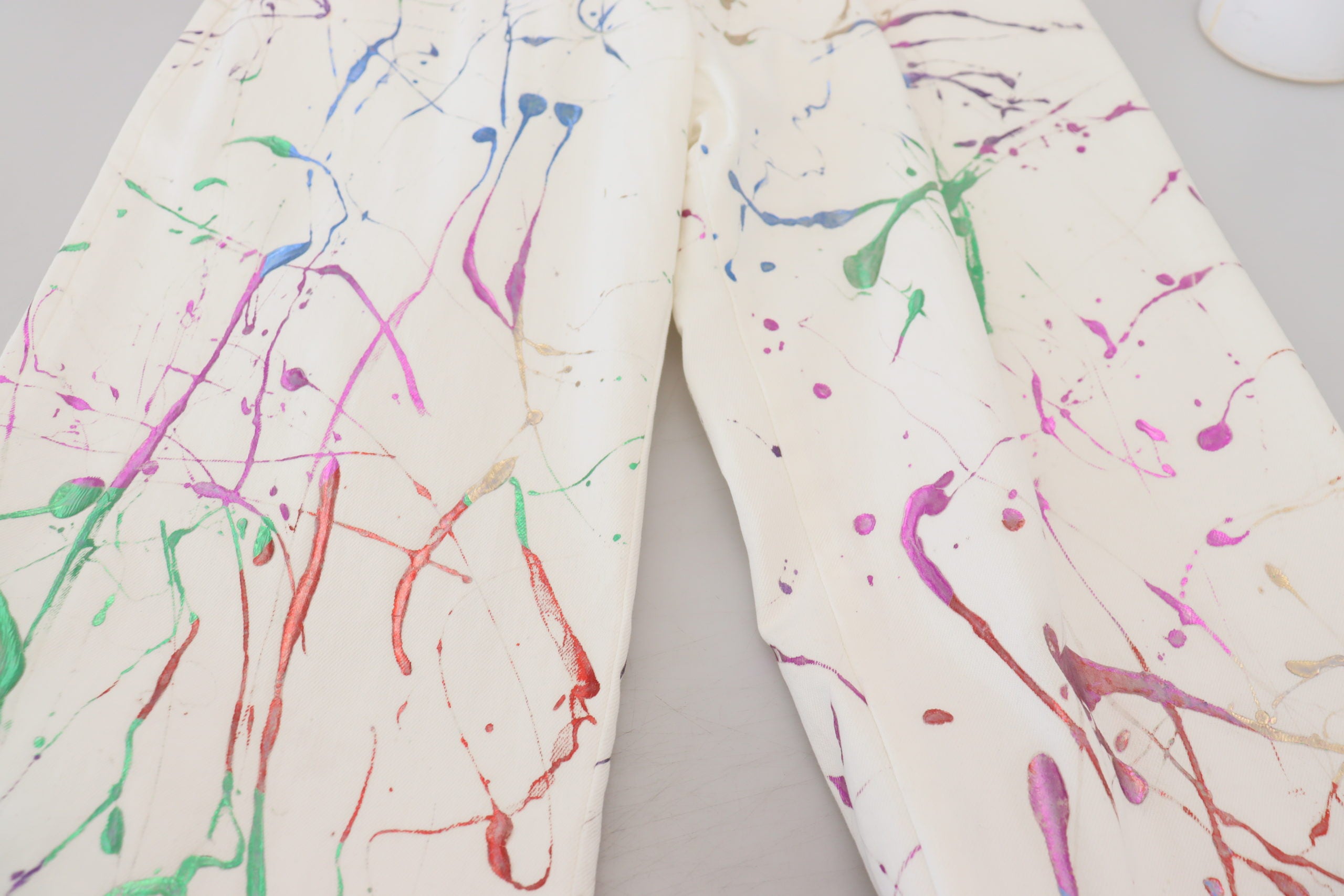 Witte katoenen denim broek met kleurspattenprint