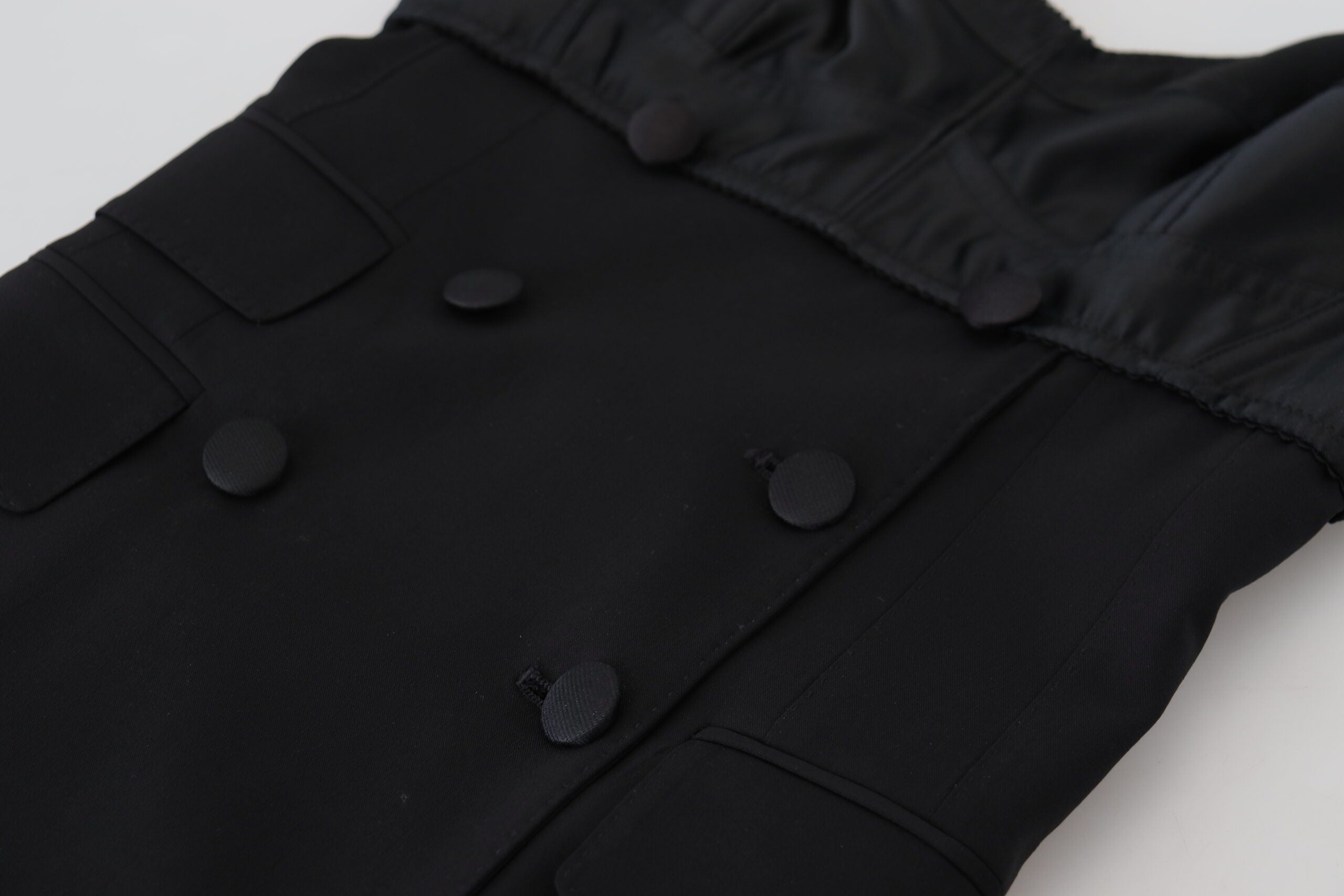 Zwarte, nauwsluitende, wollen stretch mini-jurk