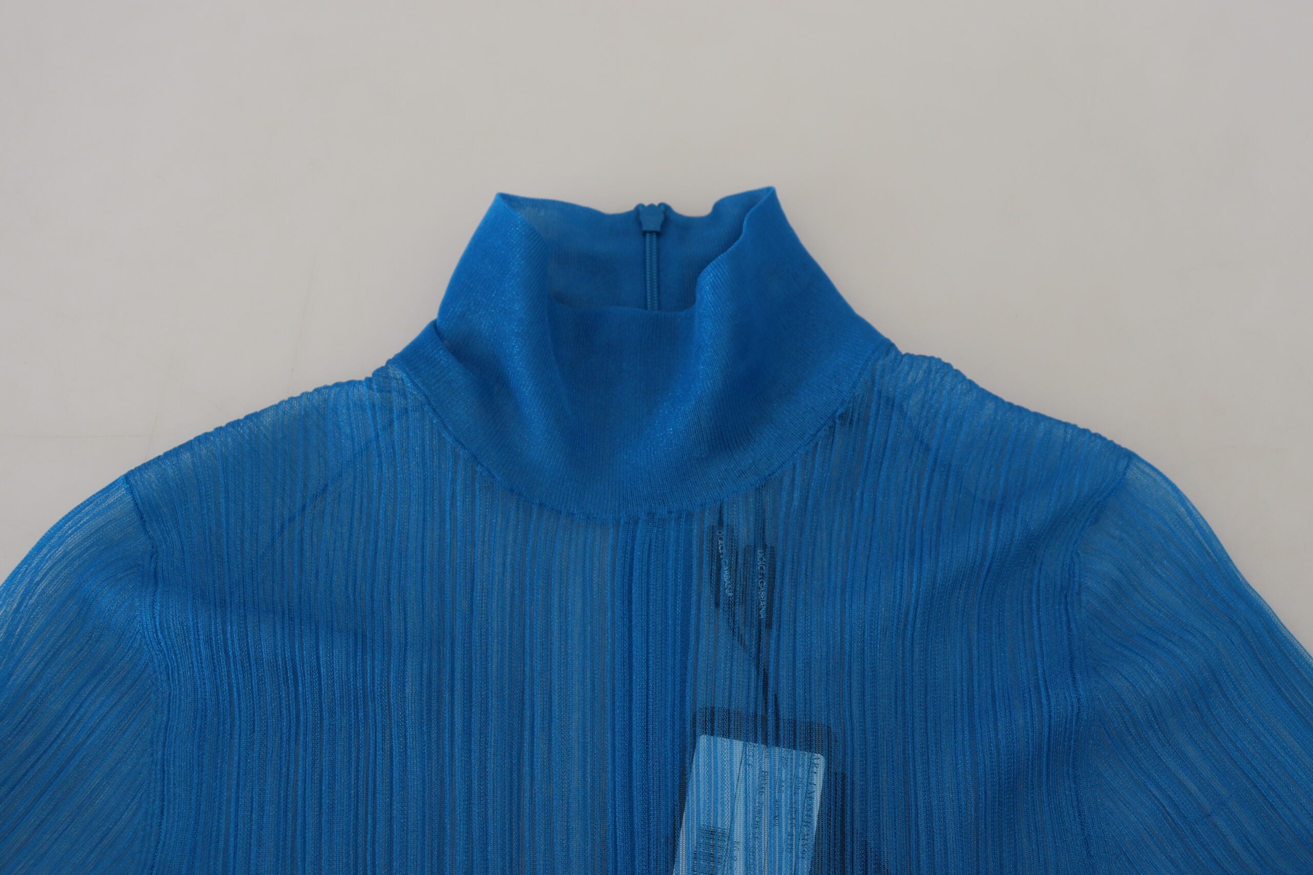 Blauwe mesh coltrui blouse met lange mouwen