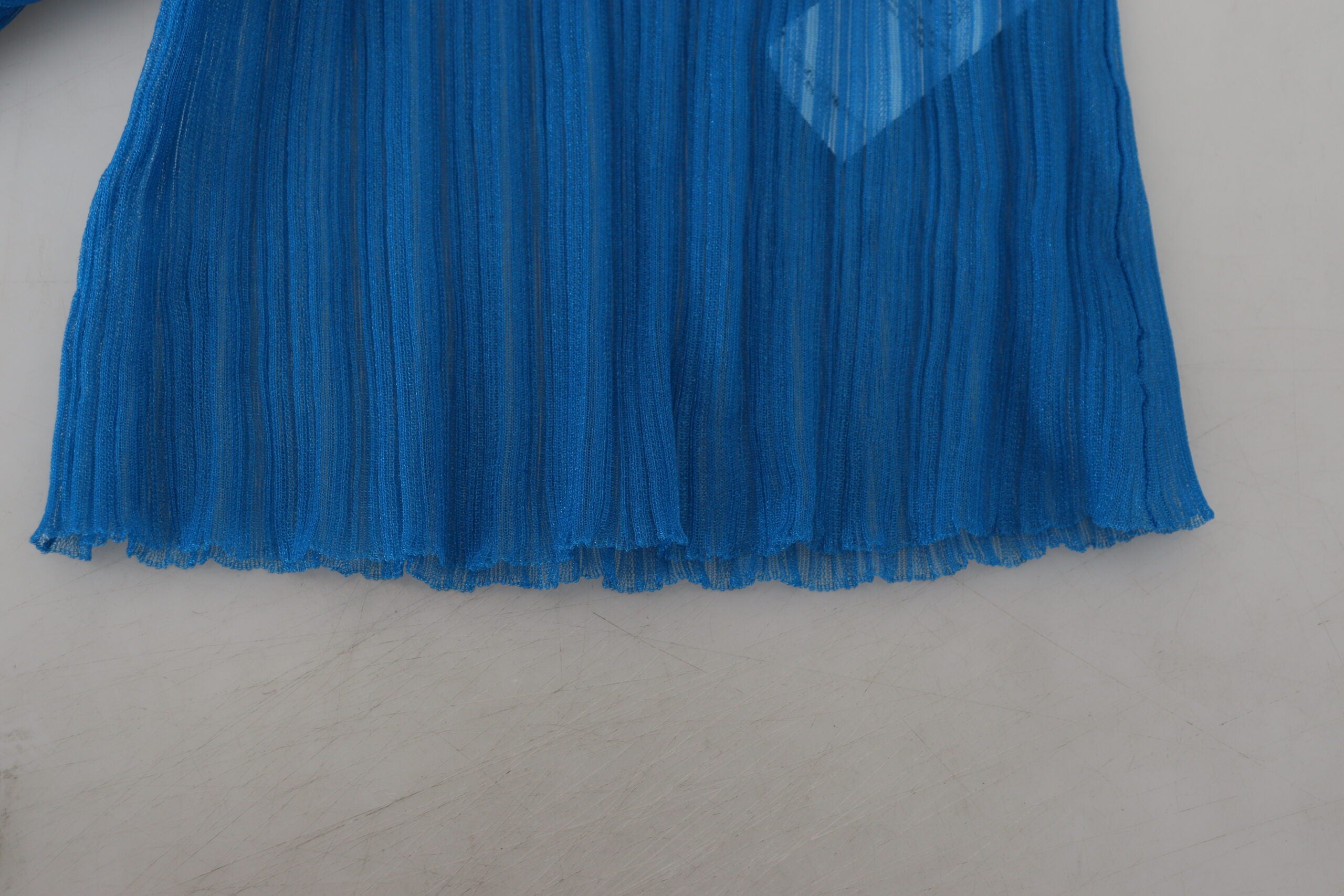 Blauwe mesh coltrui blouse met lange mouwen