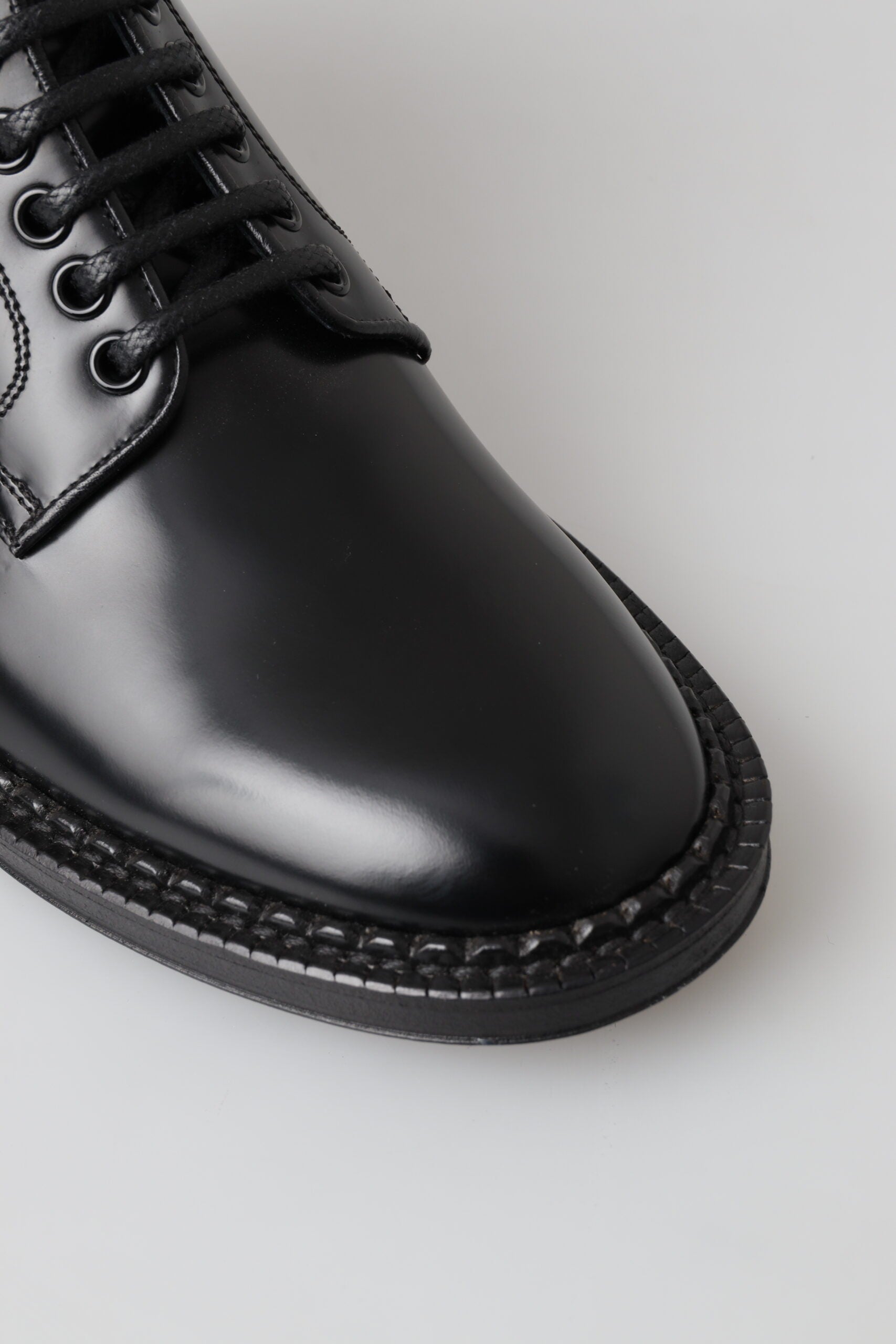Zwarte leren herenschoenen met korte veterlaarzen