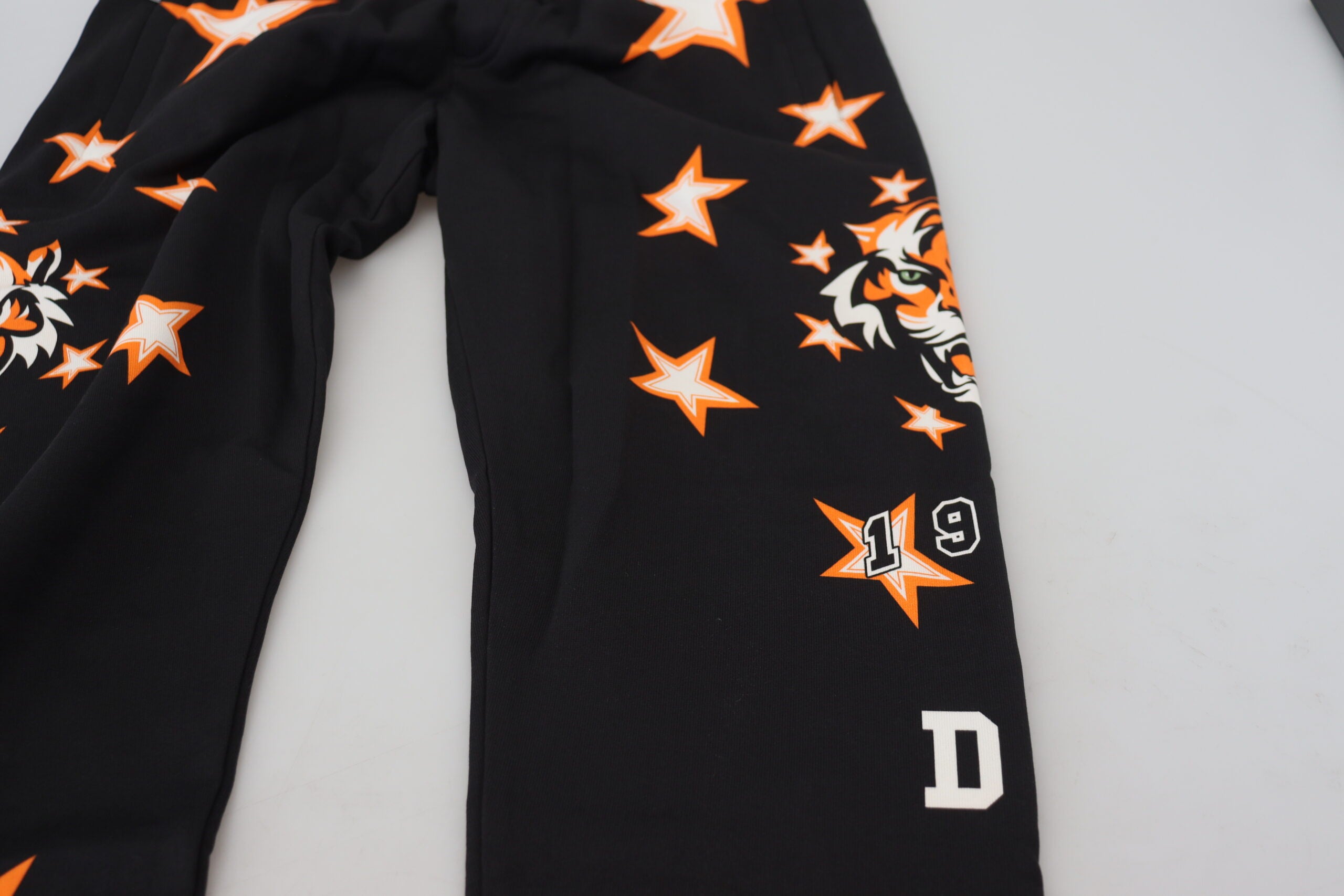 Zwarte oranje sterrenbroek sportbroek
