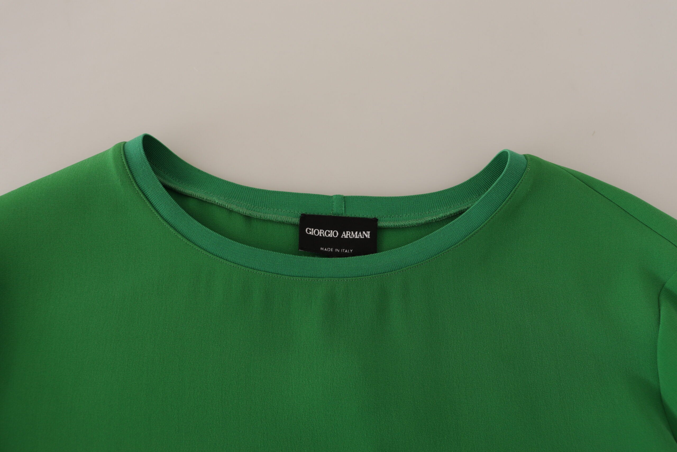 Groene zijden trui met lange mouwen en ronde hals