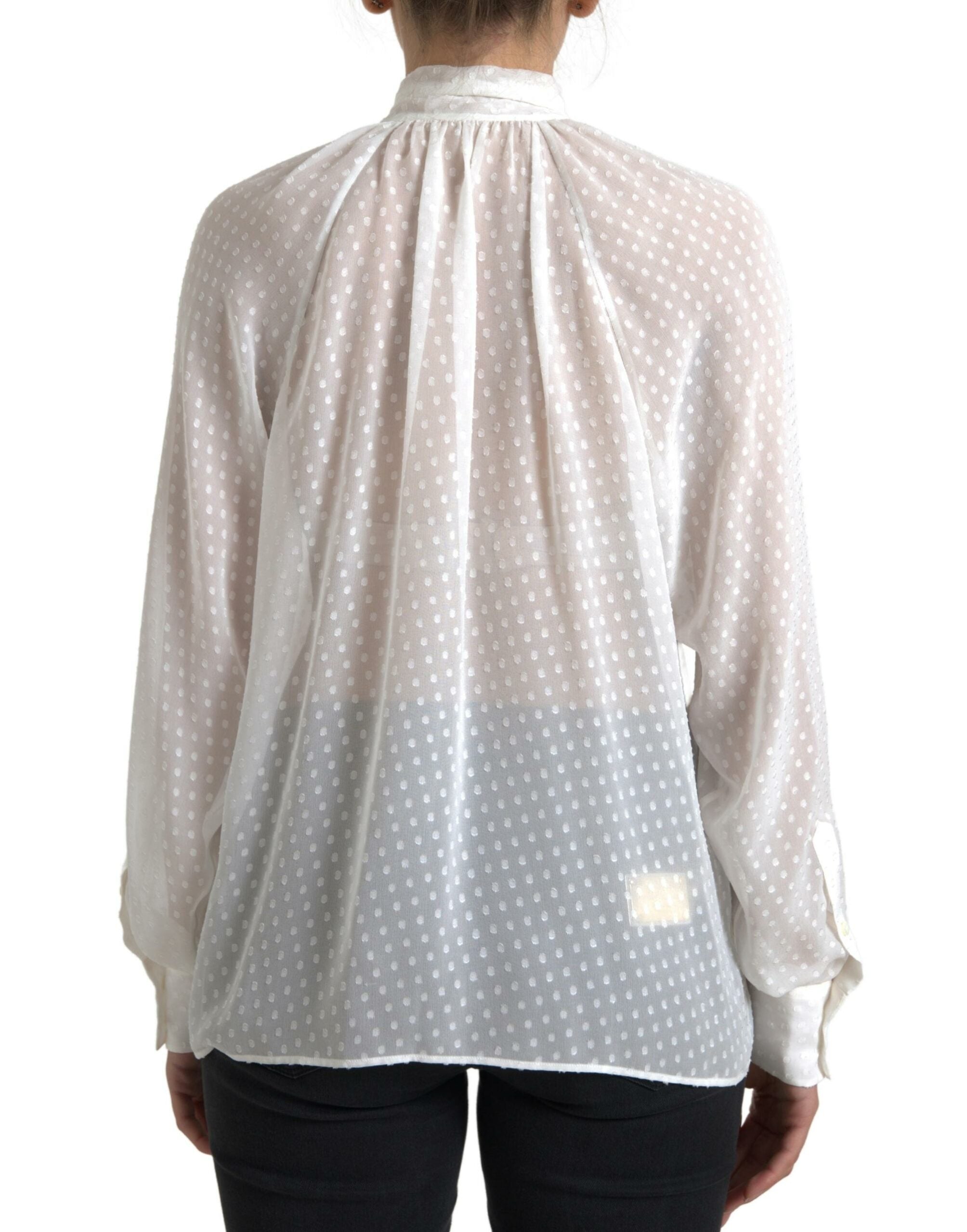 Witte zijden blouse met doorschijnende hals en stippenmotief