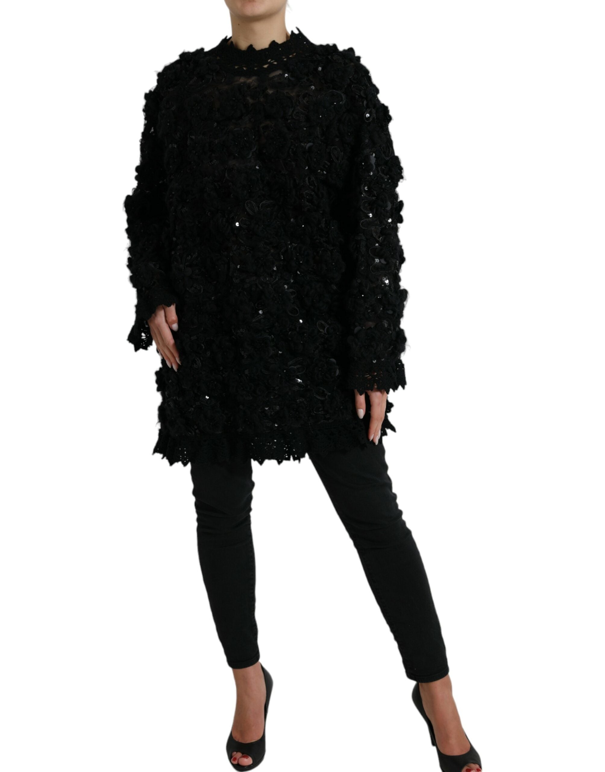 Zwarte met pailletten versierde pullover