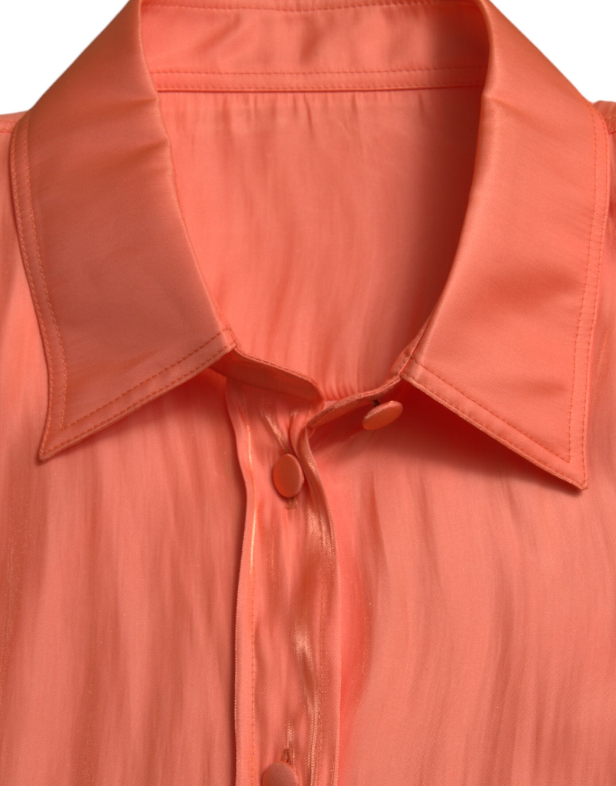 Perzikkleurige blouse met lange mouwen en knoopjes