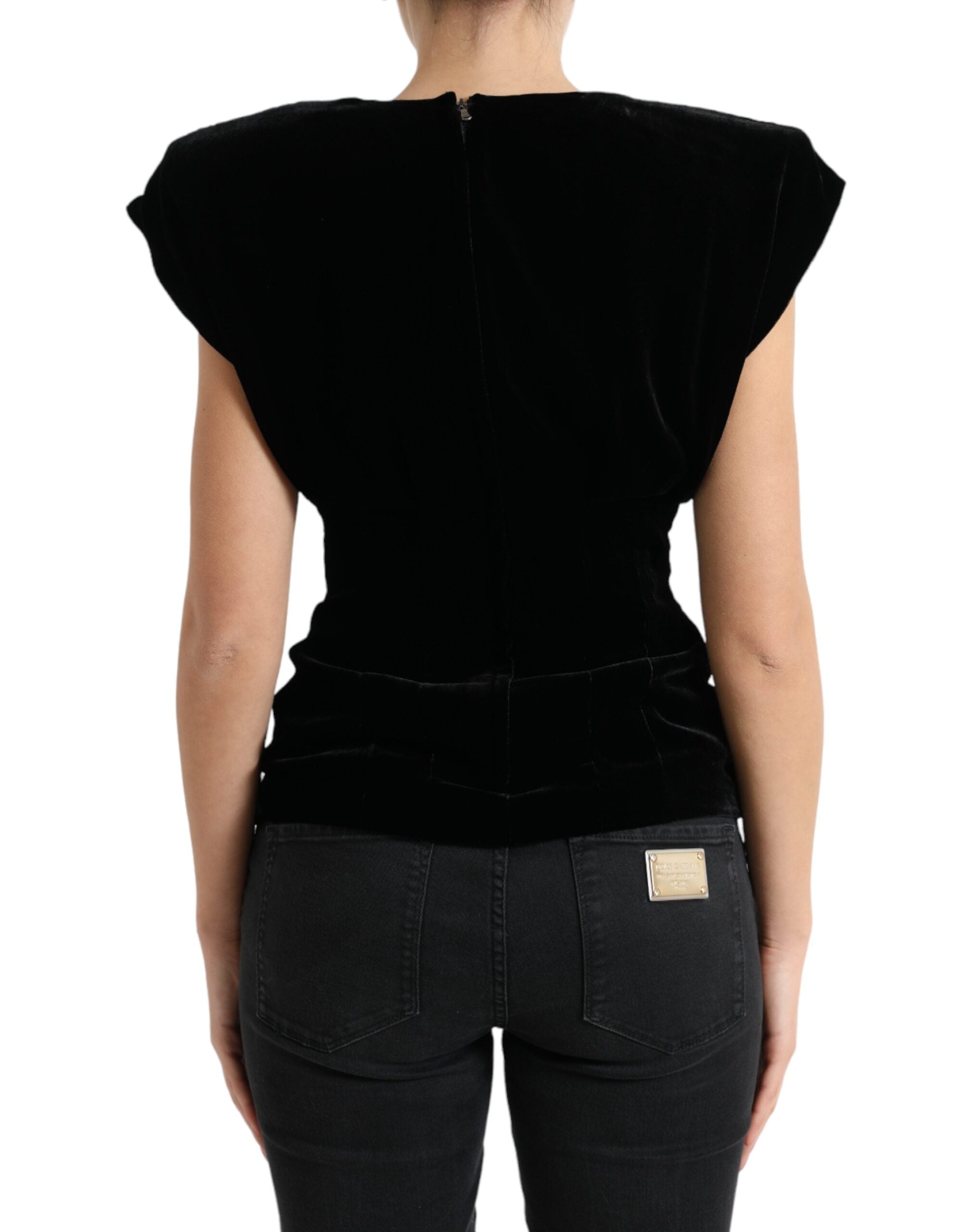 Zwarte fluwelen blouse met gewatteerde schoudervullingen