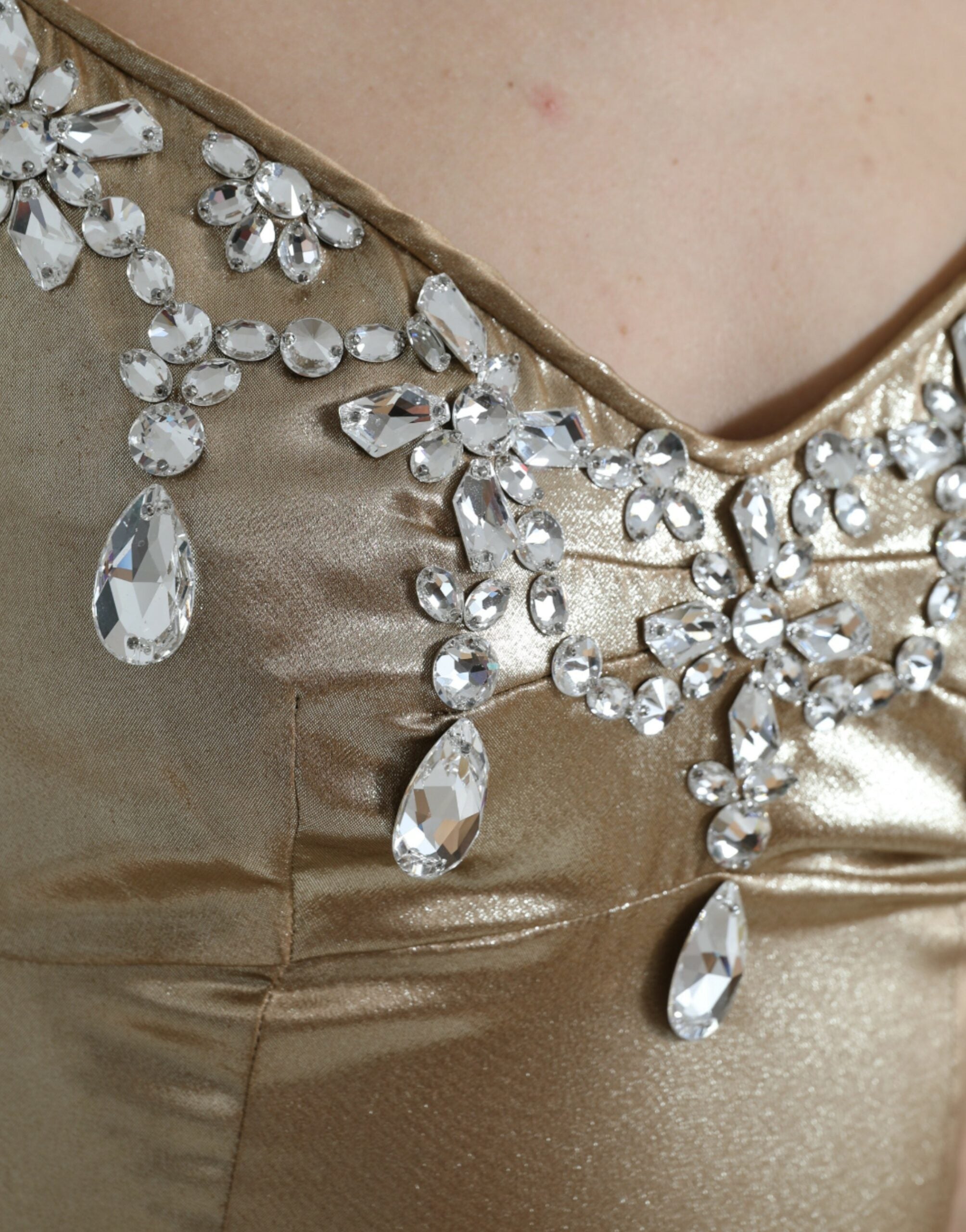 Metallic gouden jurk met kristallen versiering