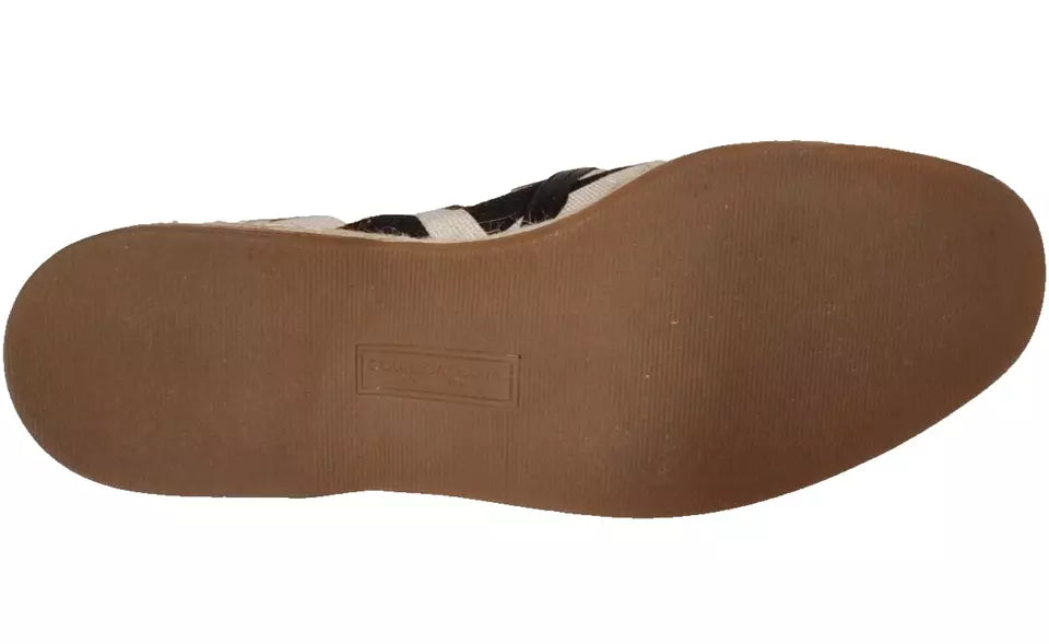 Zwarte en witte espadrilles met strepen