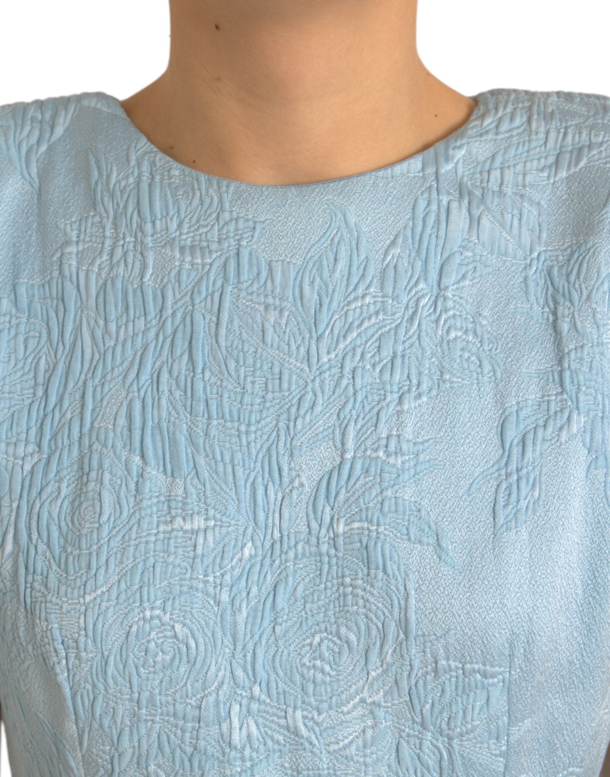 Lichtblauwe mini-jurk met jacquardprint en bloemenprint