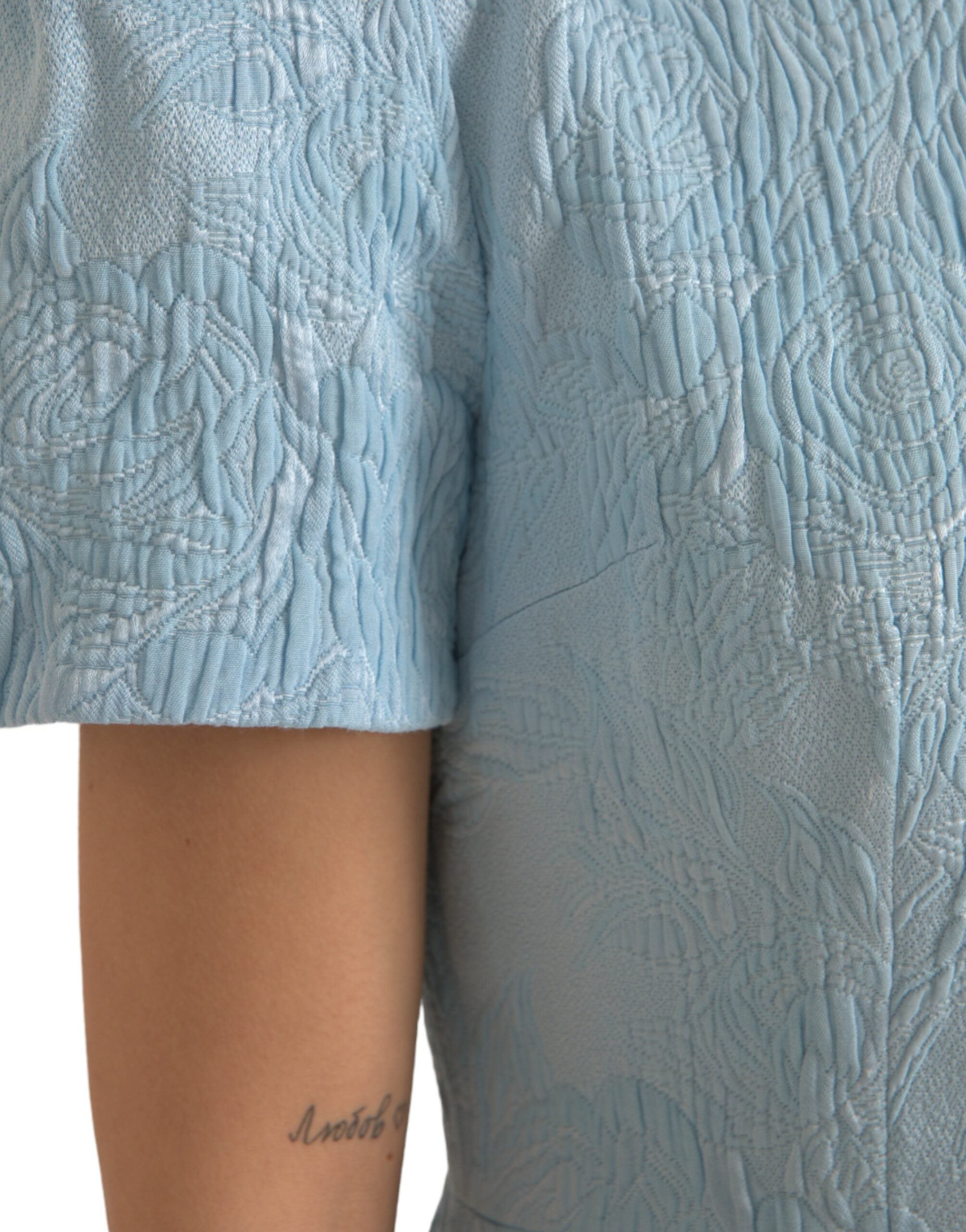 Lichtblauwe mini-jurk met jacquardprint en bloemenprint