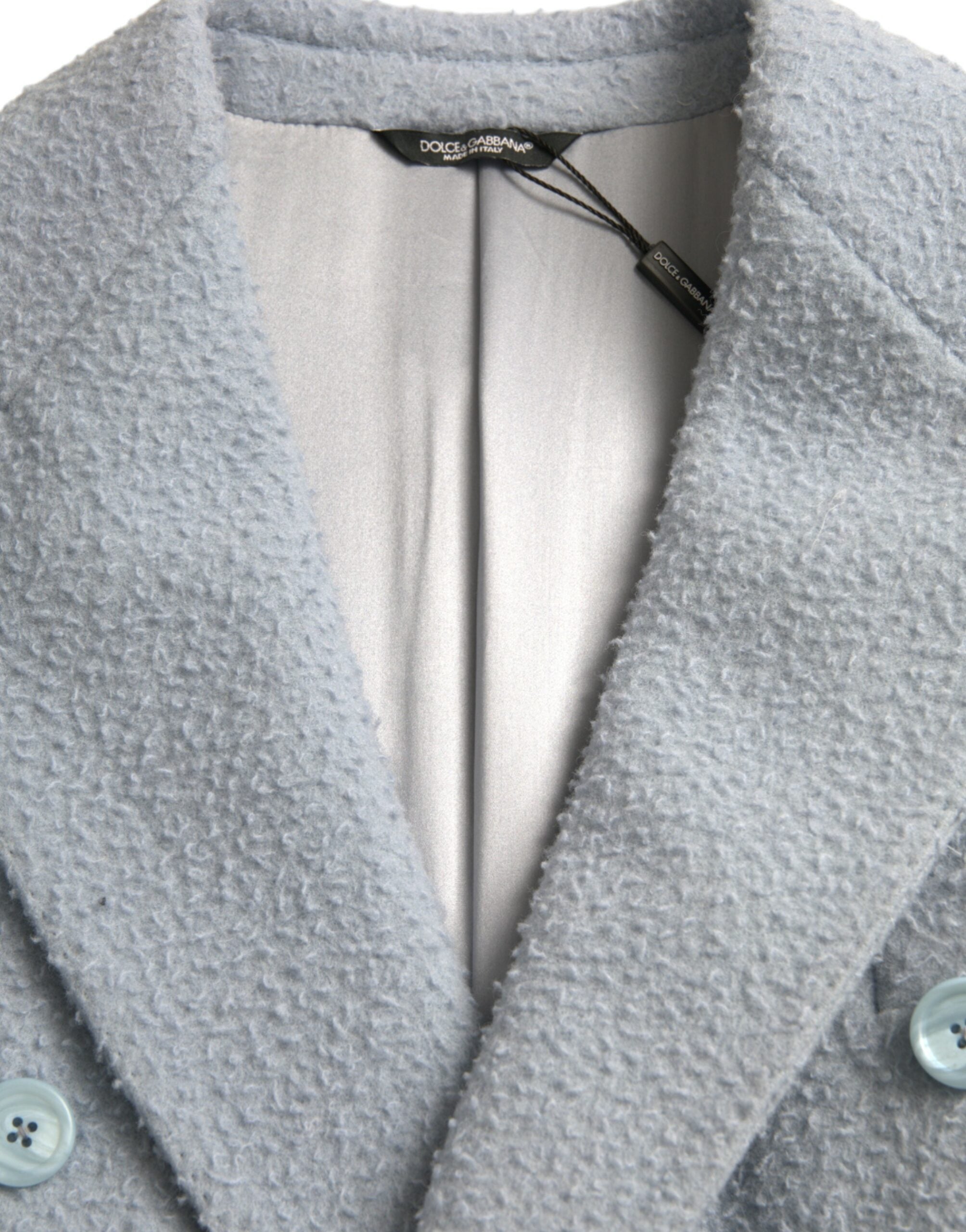 Blauwe dubbele rij knopen lange trenchcoat jas