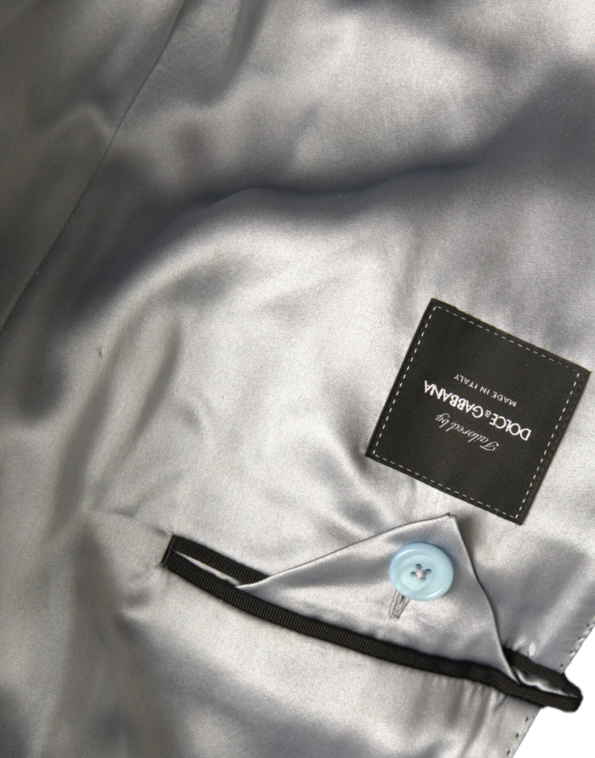 Blauwe dubbele rij knopen lange trenchcoat jas