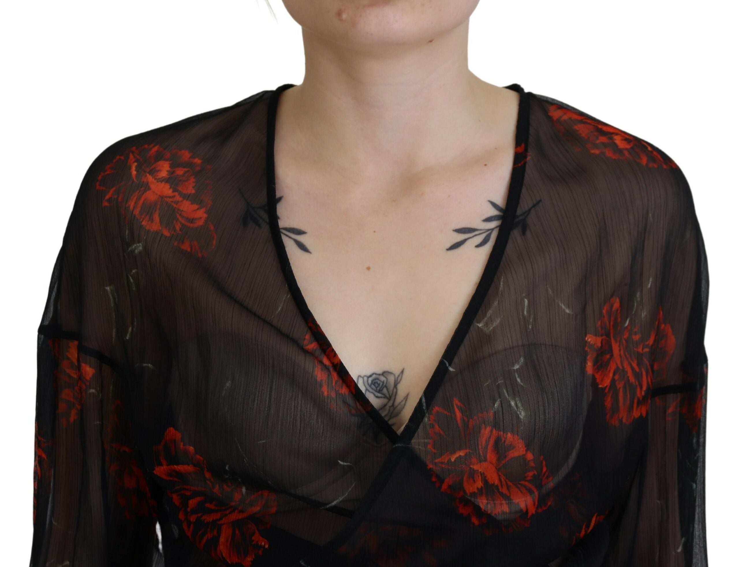 Zwarte cropped top met lange mouwen en bloemenprint