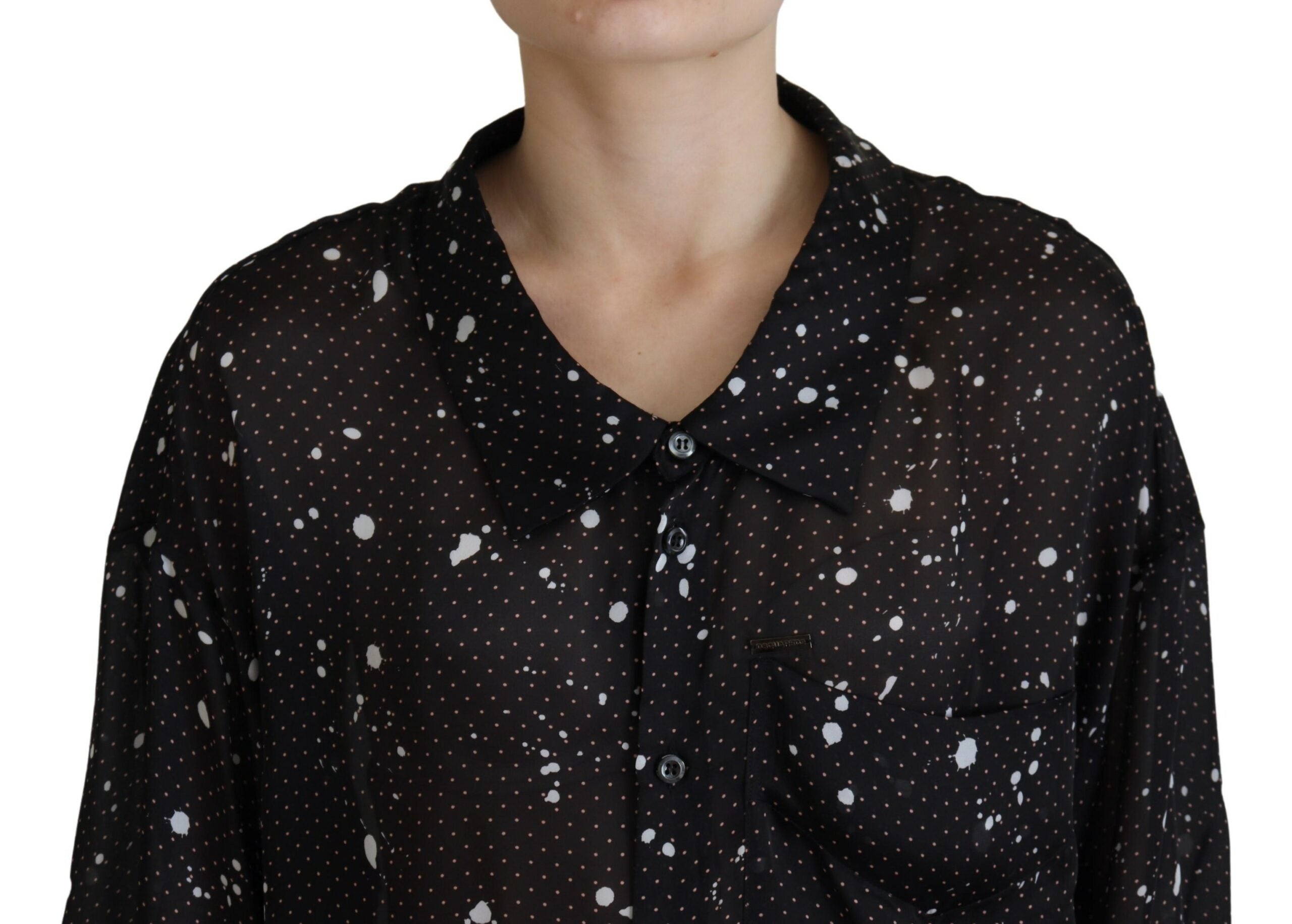 Zwarte blouse met stippen en kraag en knoopjes