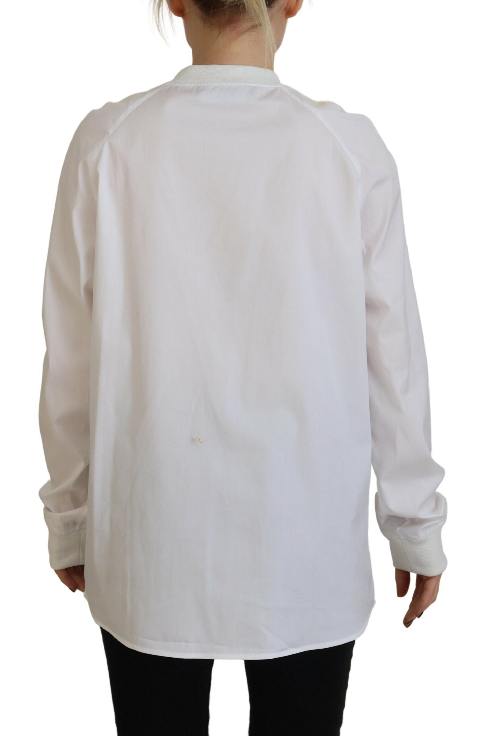 Witte katoenen top met lange mouwen en ronde hals