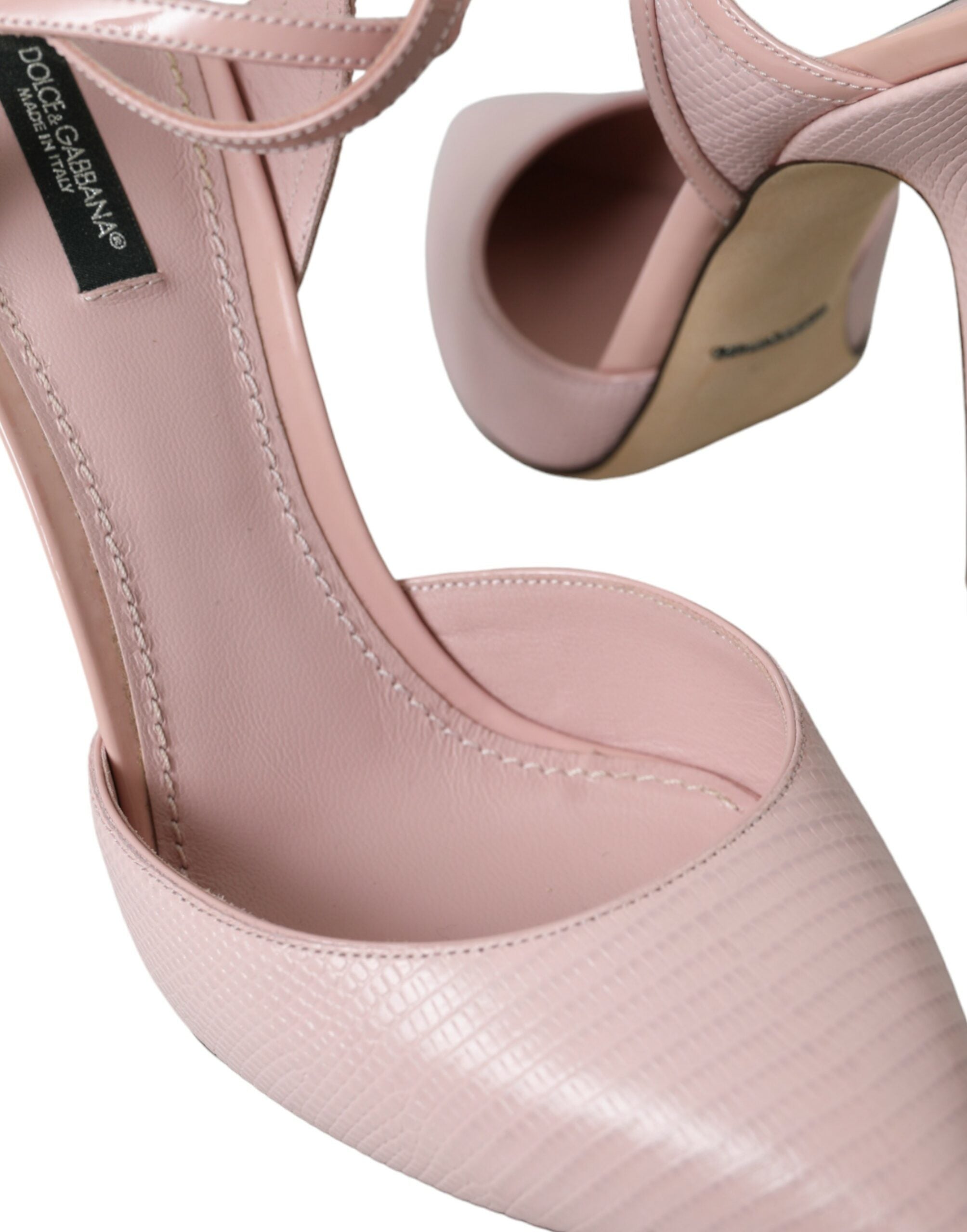 Roze leren enkelbandjes met hakken en pumps
