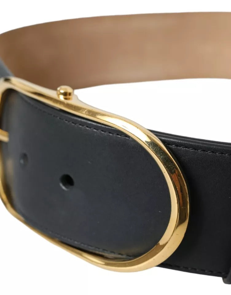 Zwarte leren riem met ovale metalen gesp en gouden details