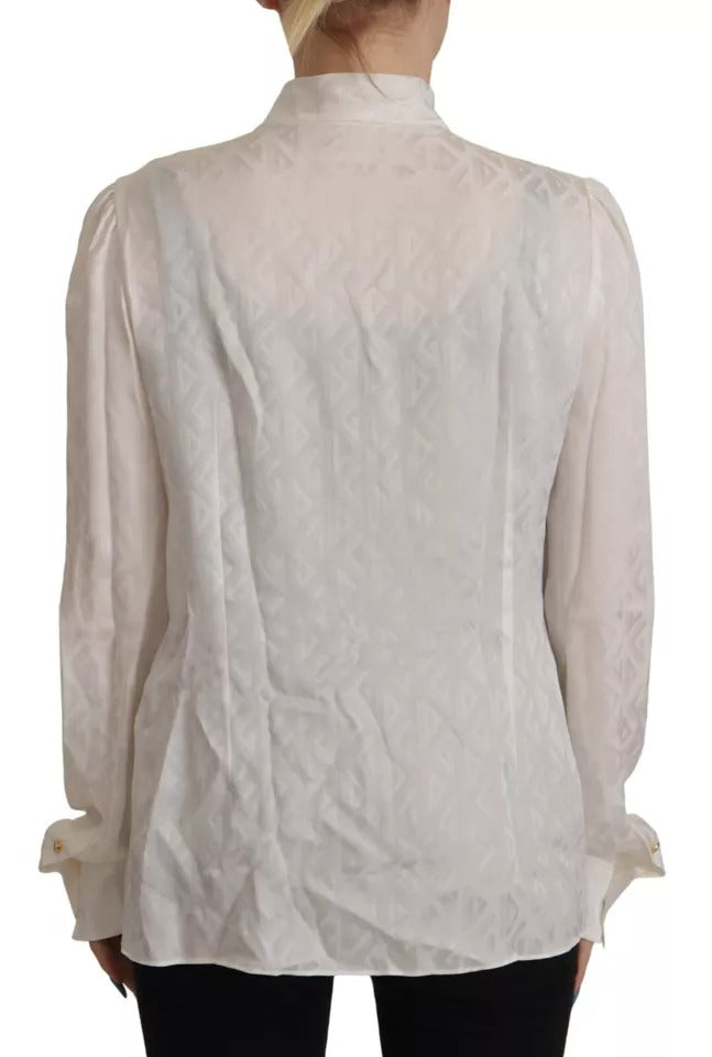 Witte blousetop met zijden Ascot-kraag en patroon