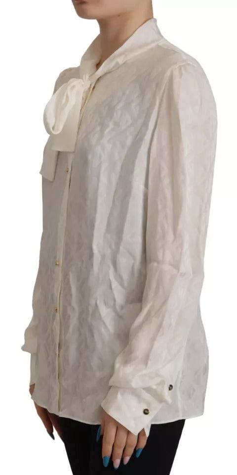Witte blousetop met zijden Ascot-kraag en patroon