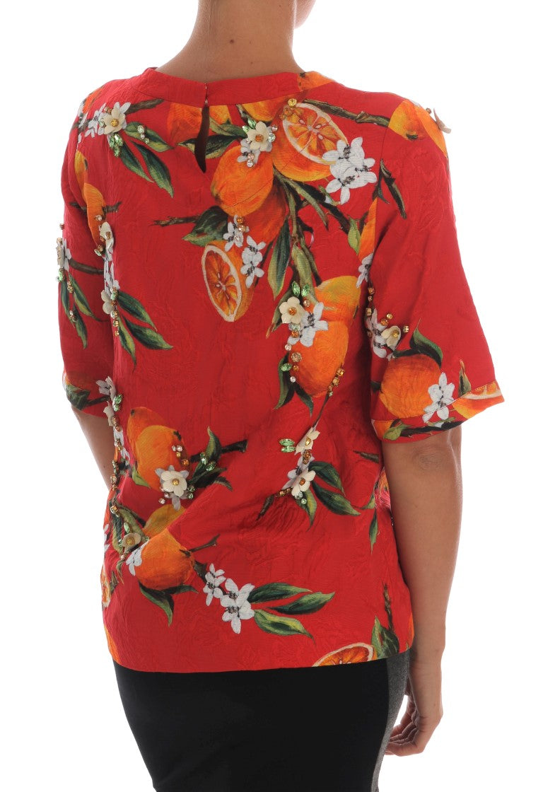 Blouse met oranje print en kristallen