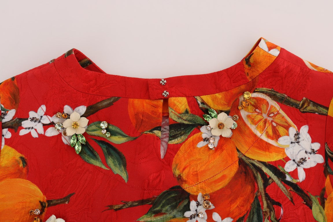 Blouse met oranje print en kristallen