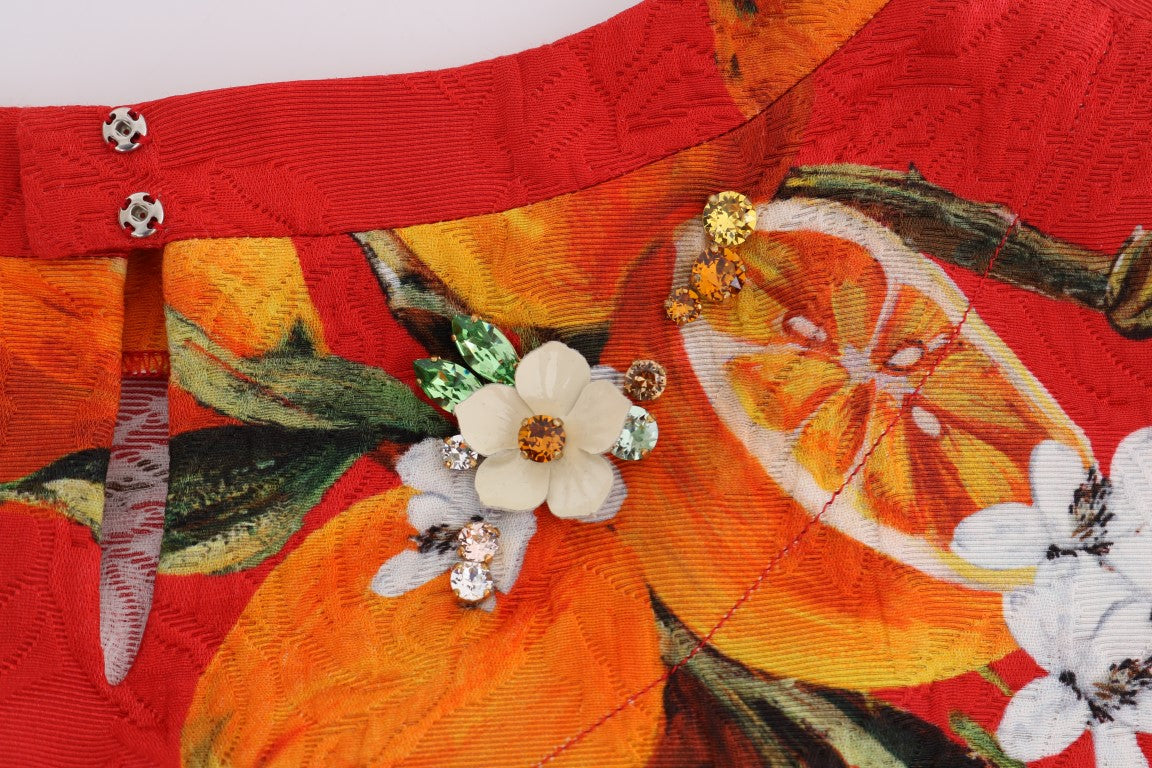 Blouse met oranje print en kristallen