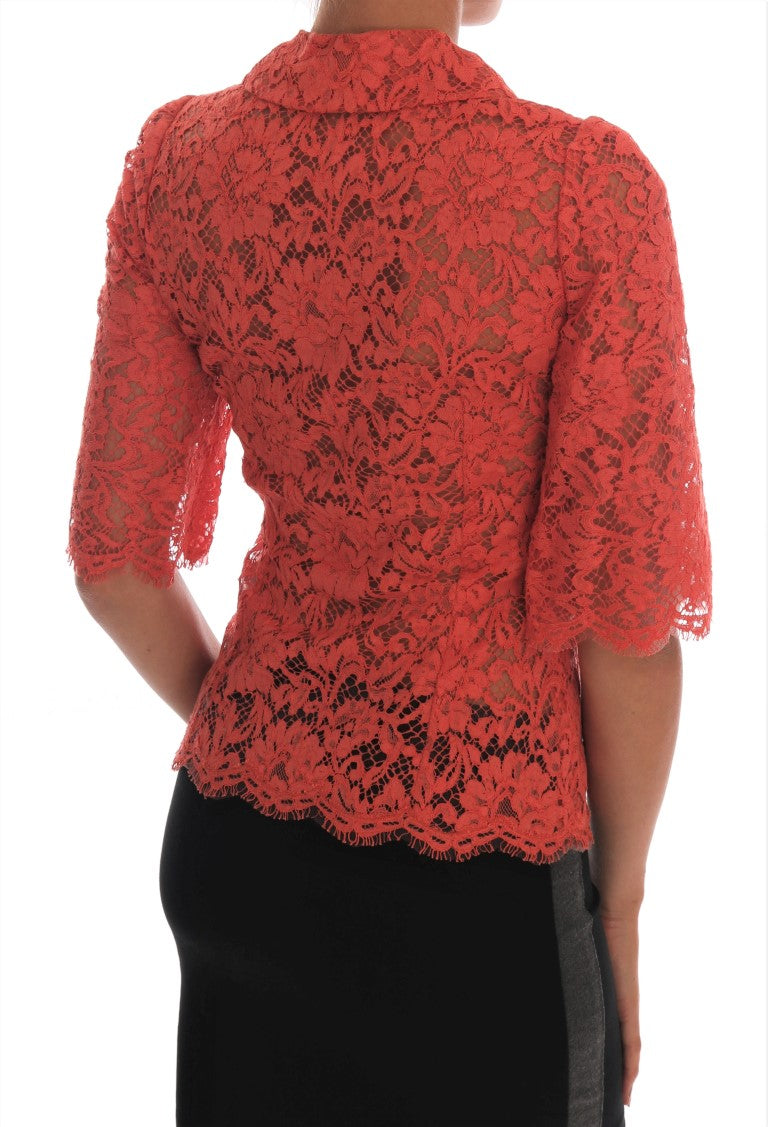 Oranje blouse met kristallen knopen en bloemenkant