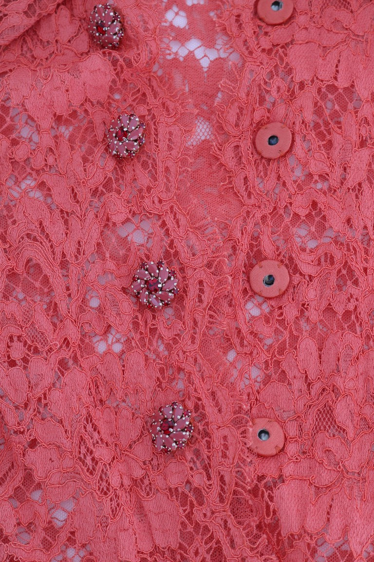 Oranje blouse met kristallen knopen en bloemenkant