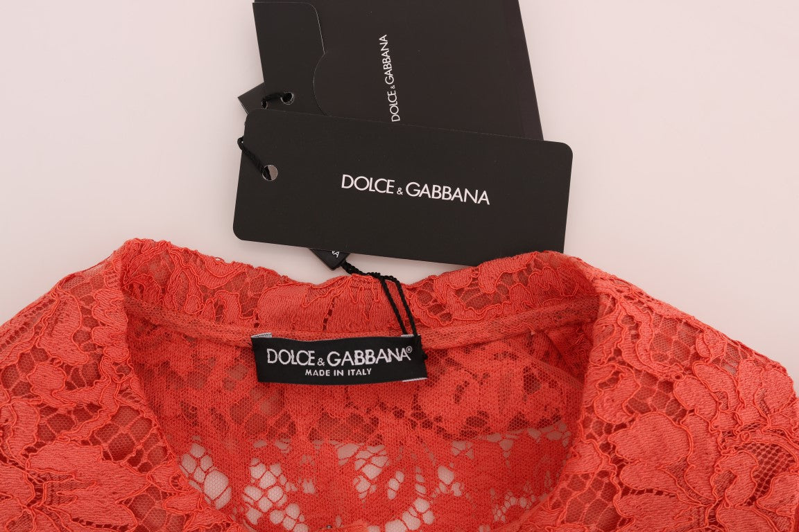 Oranje blouse met kristallen knopen en bloemenkant