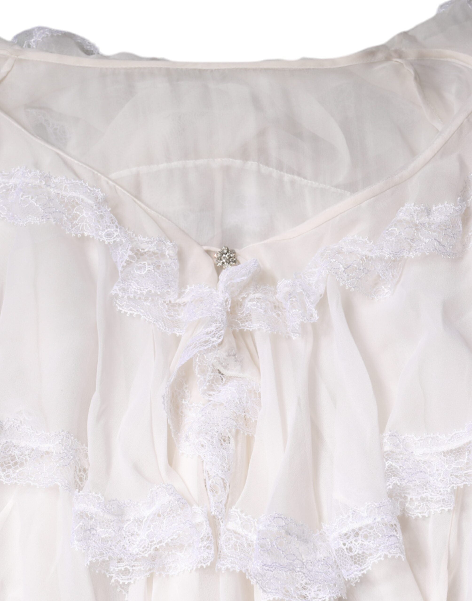 Witte blouse met lange mouwen en kant met ruches