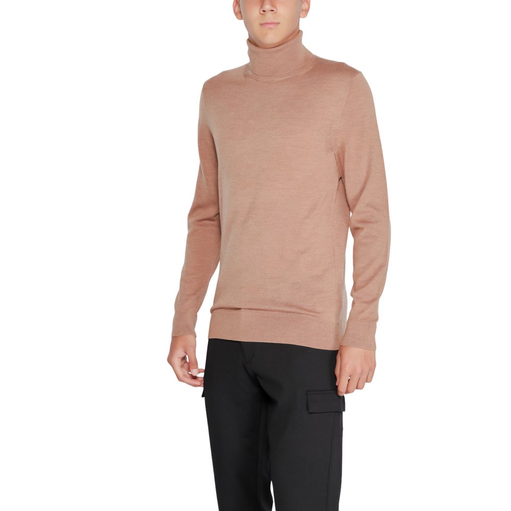 Beige wollen coltrui
