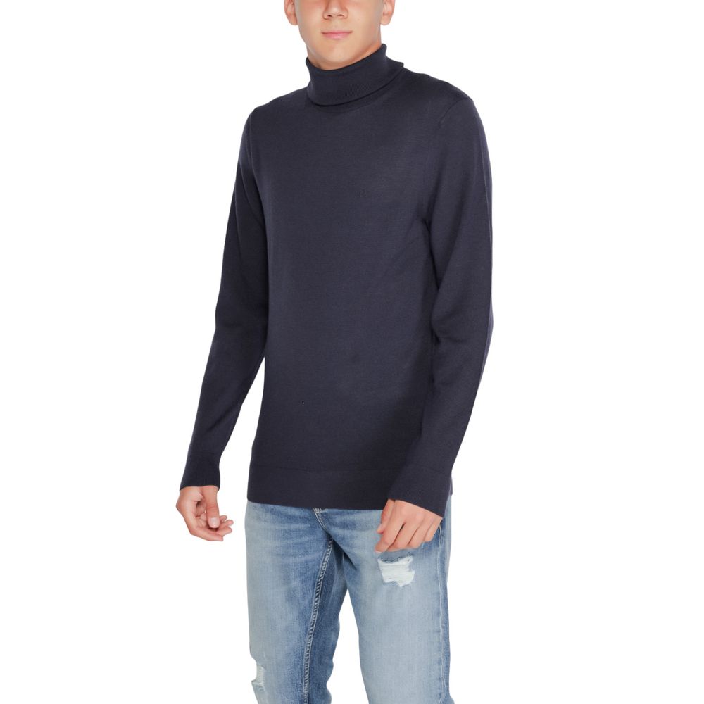 Blauwe wollen coltrui