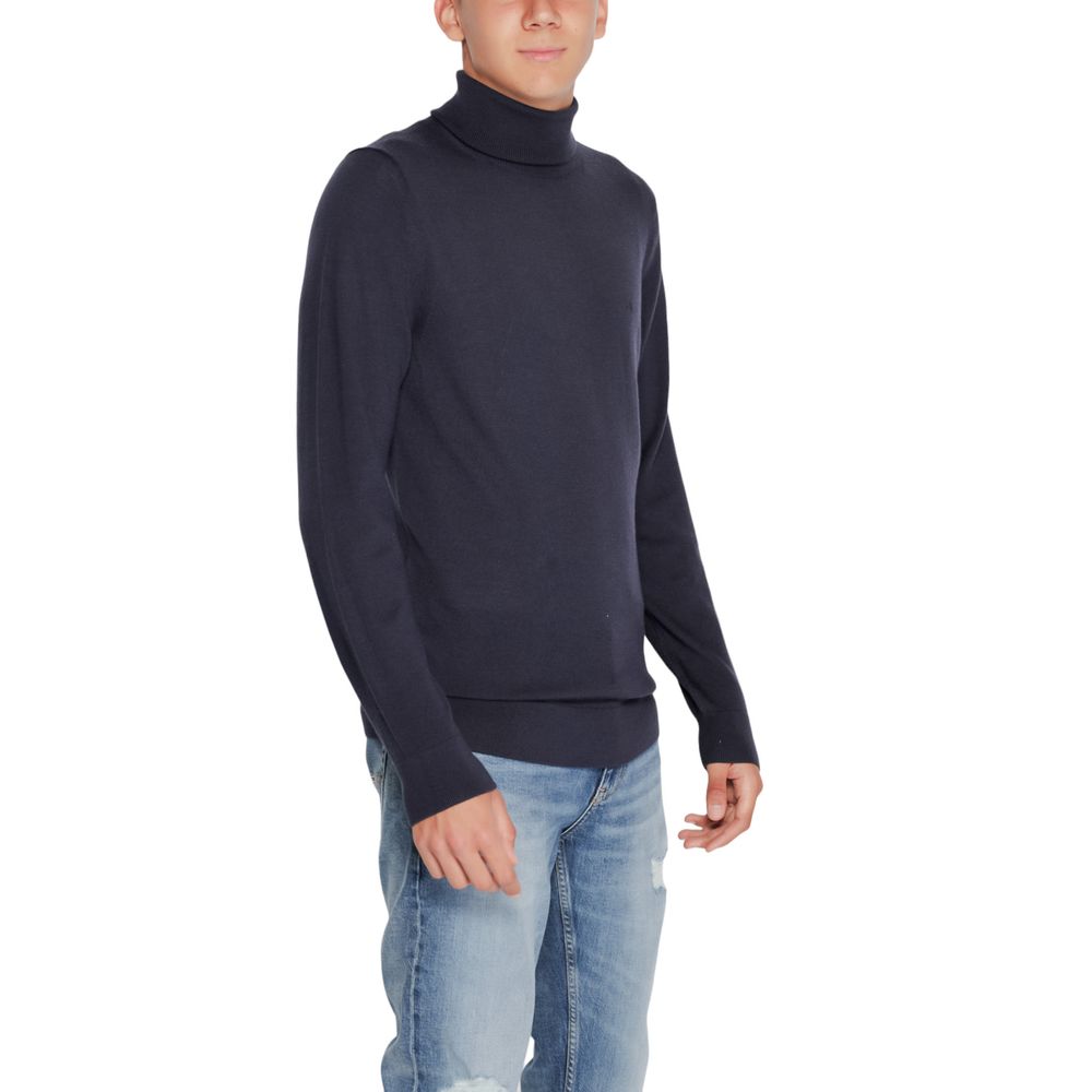 Blauwe wollen coltrui