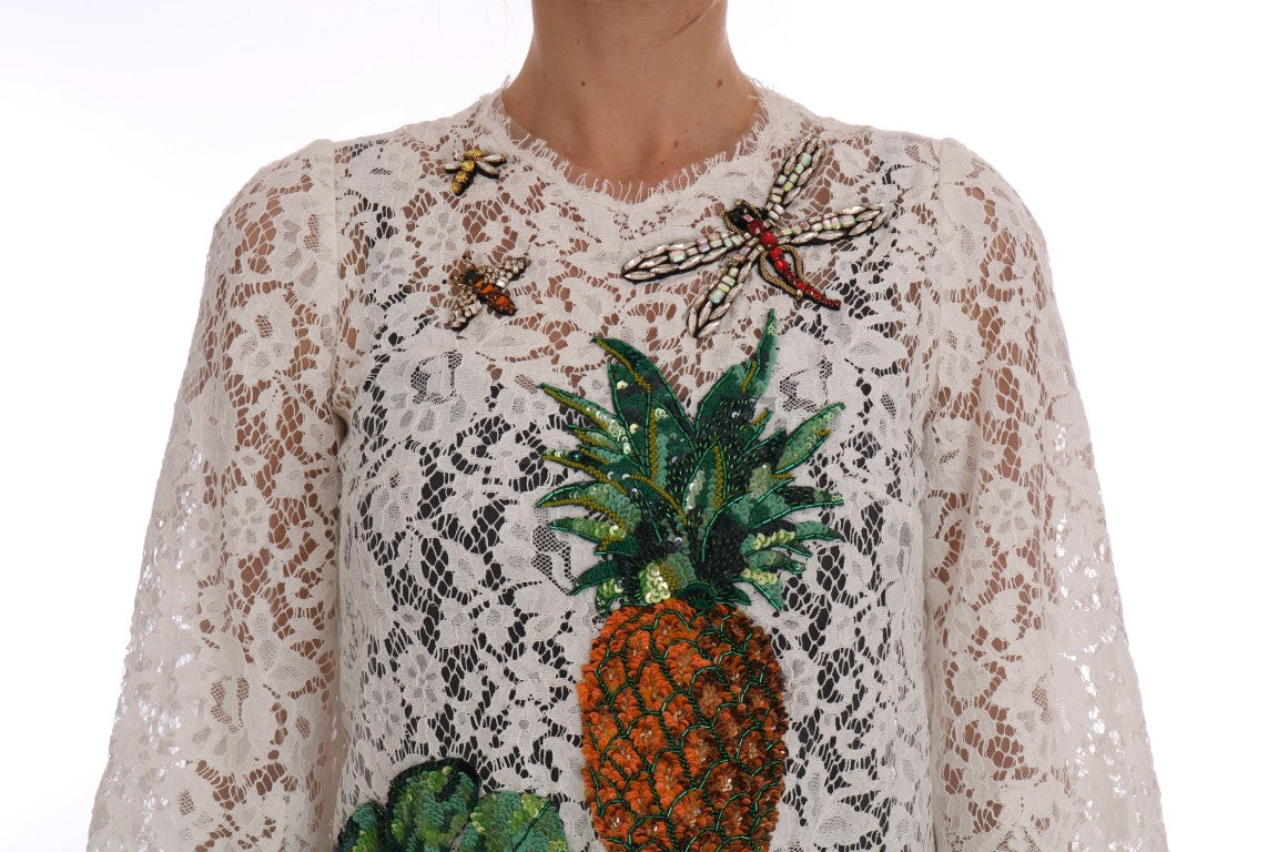 Witte blouse met kant en kristallen